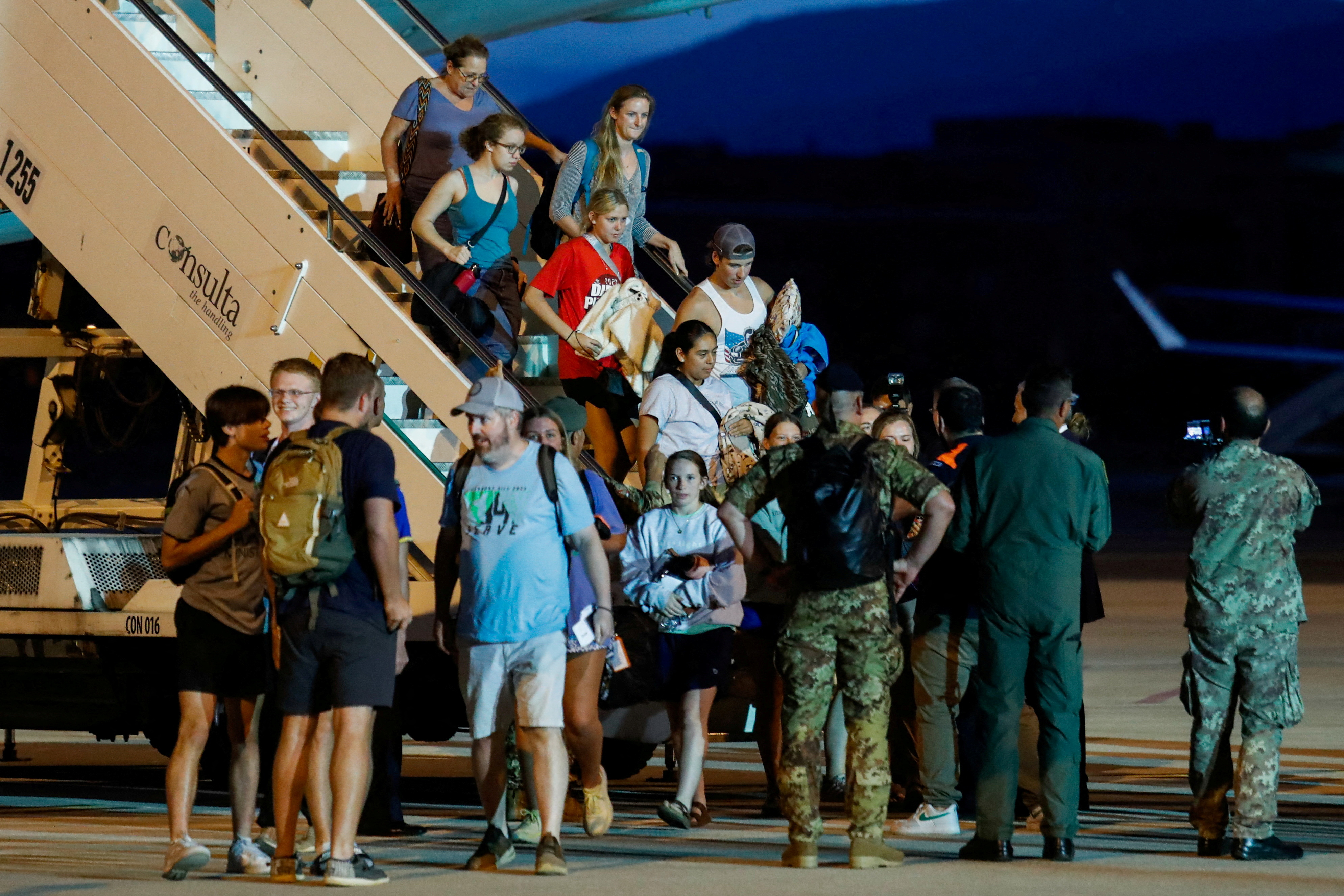 A military plane containing evacuees from Niger landed in Rome in the early hours of Wednesday morning following a military coup in the West African country./Reuters/Remo Casilli.