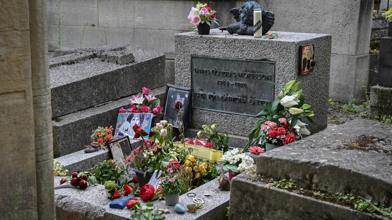 The grave of the band The Doors' frontman Jim Morrison is seen at the Pere Lachaise cemetery in Paris. /Bertrand Guay/AFP