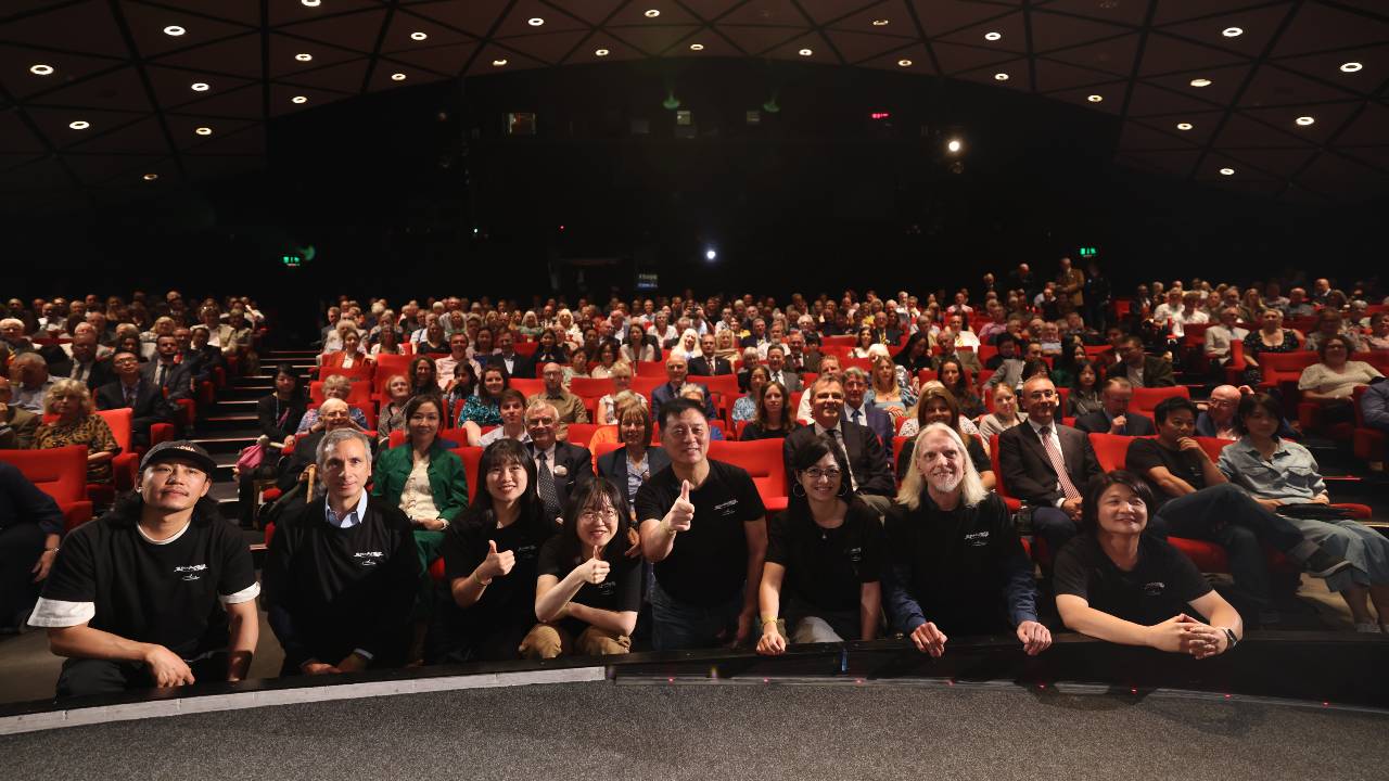 The film's crew members (front, in black T-shirts) were touched by the subject material. /Zhao Zixuan 