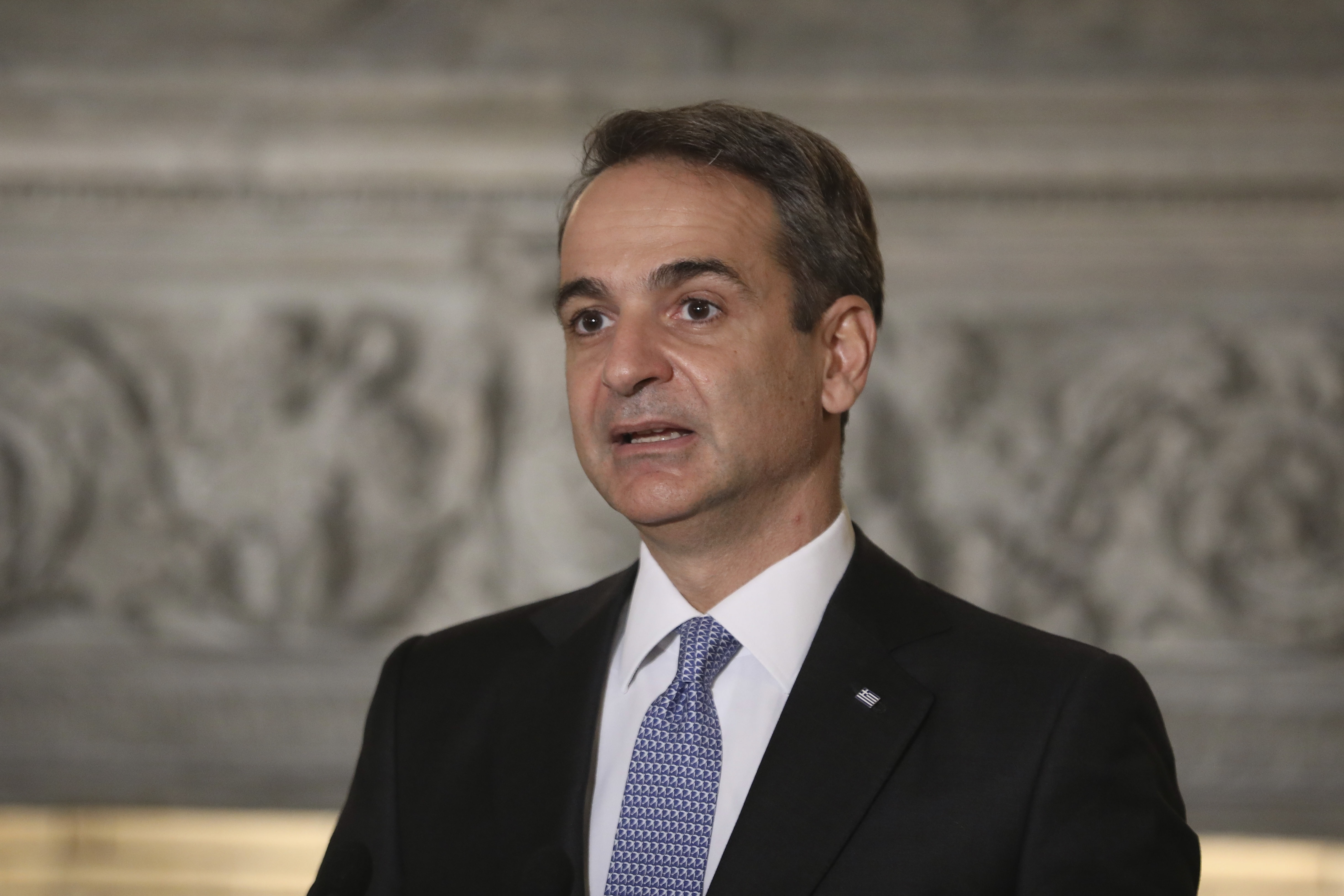 Greek Prime Minister Kyriakos Mitsotakis faces a backlash over plans to introduce new identity cards. /AP/Costas Baltas.