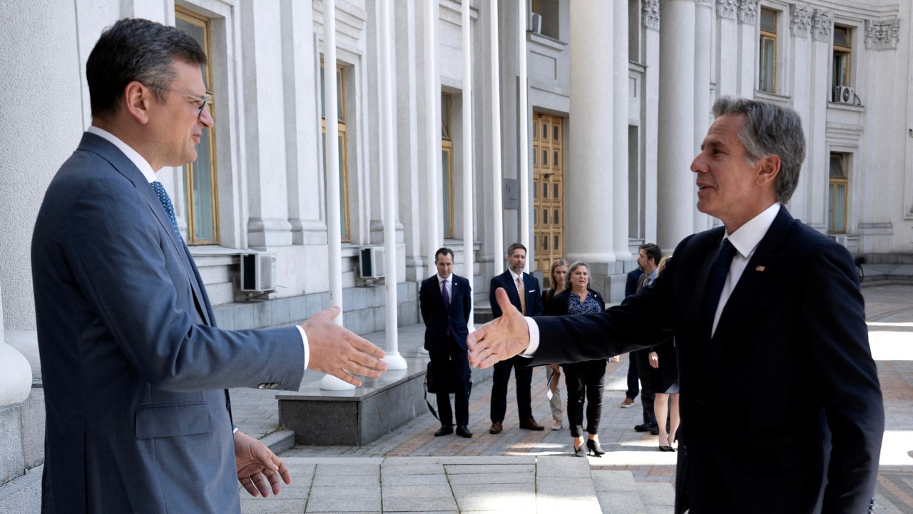 Ukraine's Foreign Minister Dmytro Kuleba greets U.S. Secretary of State Antony Blinken on Wednesday morning. /Brendan Smialowski/Pool via Reuters