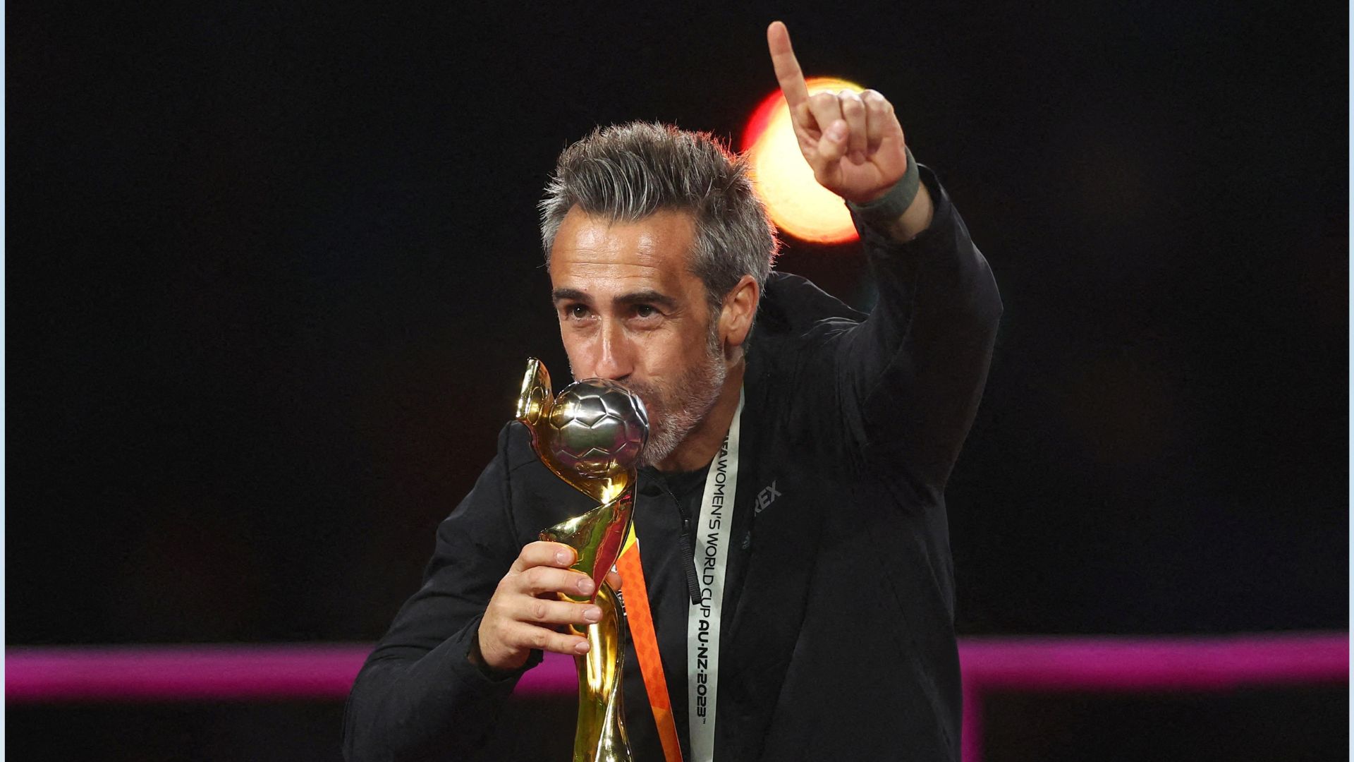 Dismissed coach Jorge Vilda celebrates with the trophy after winning the World Cup. /Carl Recine/Reuters