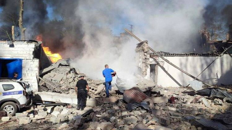 Rescuers in Kryvyi Rih after an air strike on a police building. Press service of the State Emergency Service of Ukraine/ Reuters 