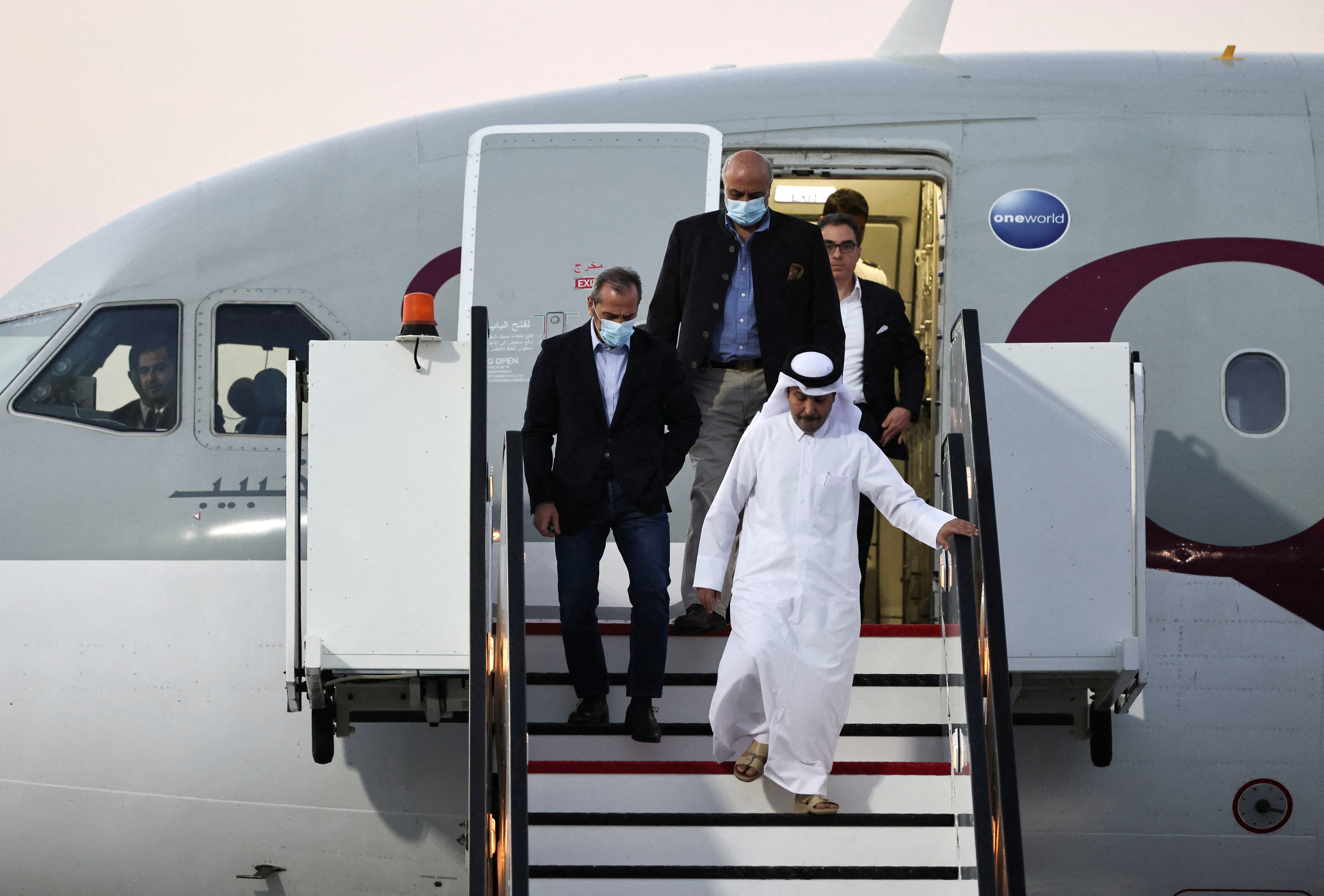 Siamak Namazi, Morad Tahbaz and Emad Shargi, who were released during a prisoner swap deal between U.S. and Iran, arrive at Doha International Airport, Qatar. /Reuters/Mohammed Dabbous.