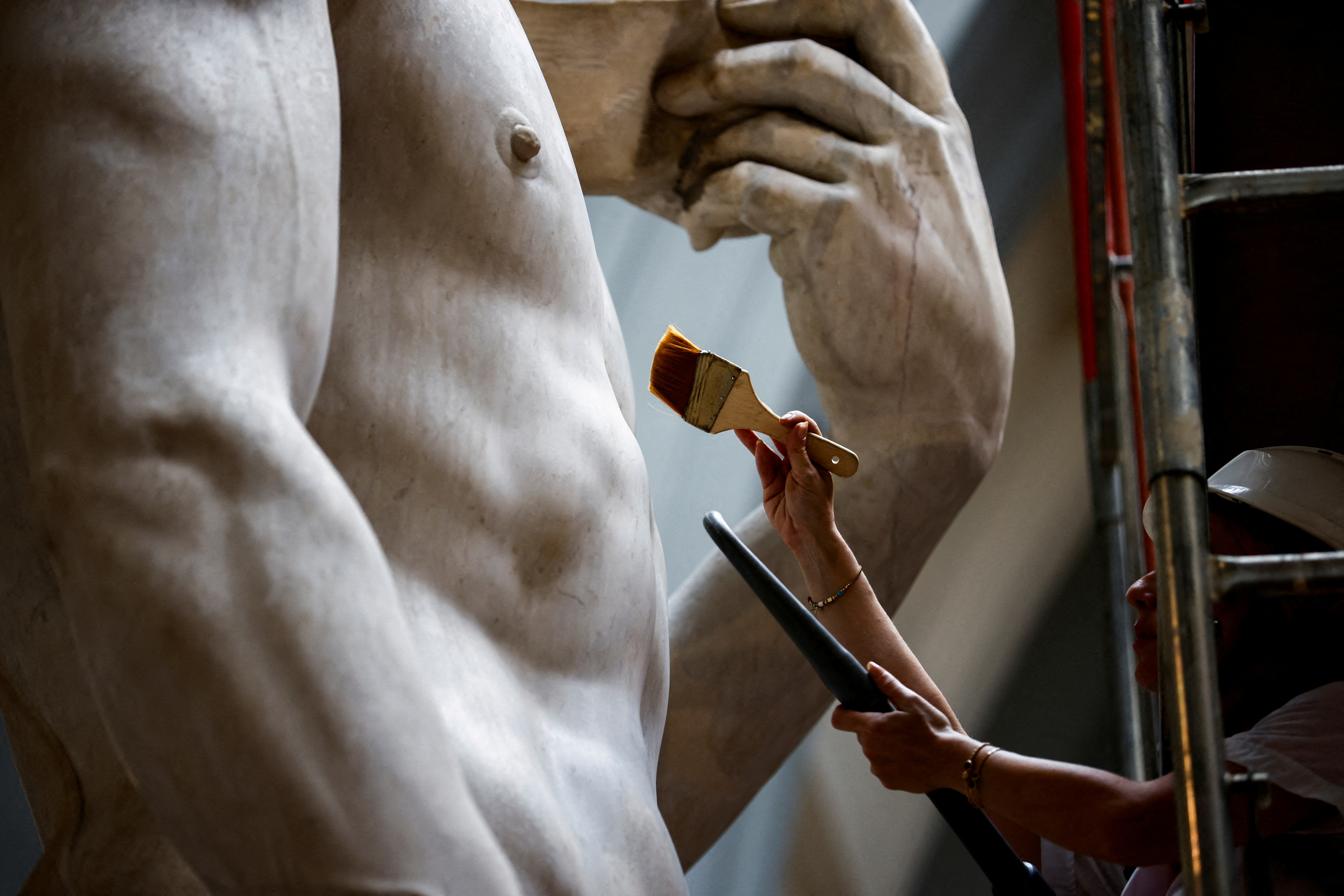 In 1843 the statue was damaged when hydrochloric acid was used to restore the marble masterpiece. But now, sensitive brushes and other instruments are used that avoid touching the marble. /Yara Nardi/Reuters