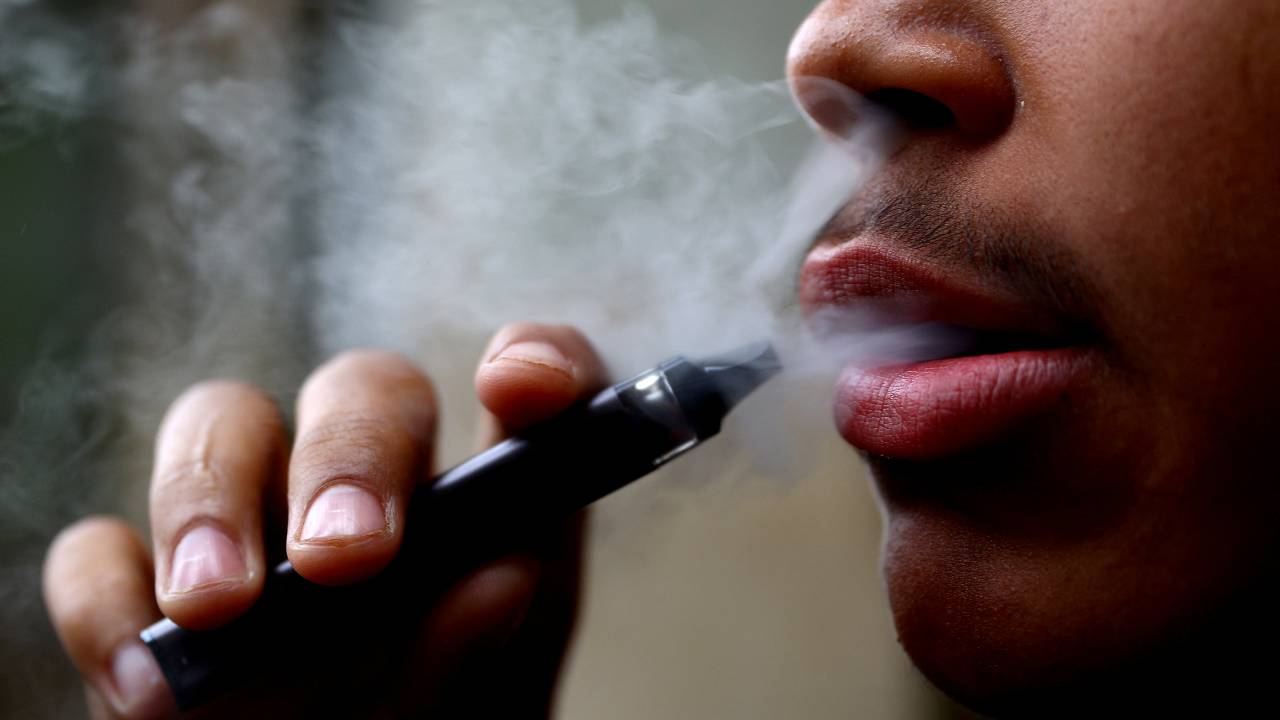 Teenagers are risking life-long addiction - and a change to their brain's make-up - by starting to vape so early, according to scientists. /Carl Recine/Reuters