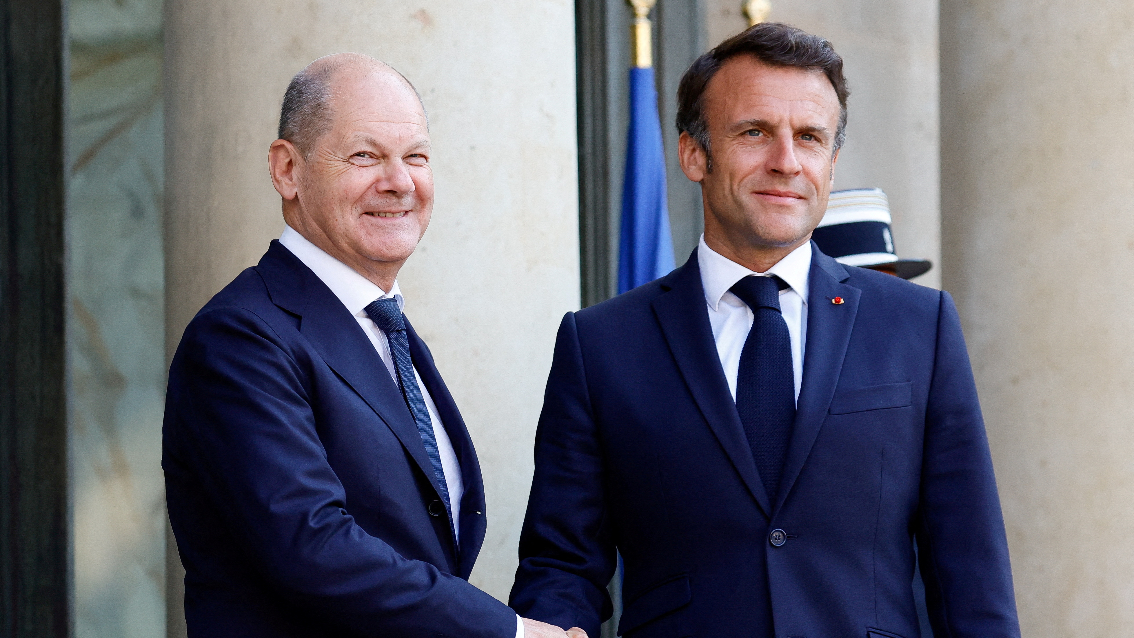 Scholz, left, and Macron will take to the harbor at sunset. /Sarah Meyssonnier/Reuters