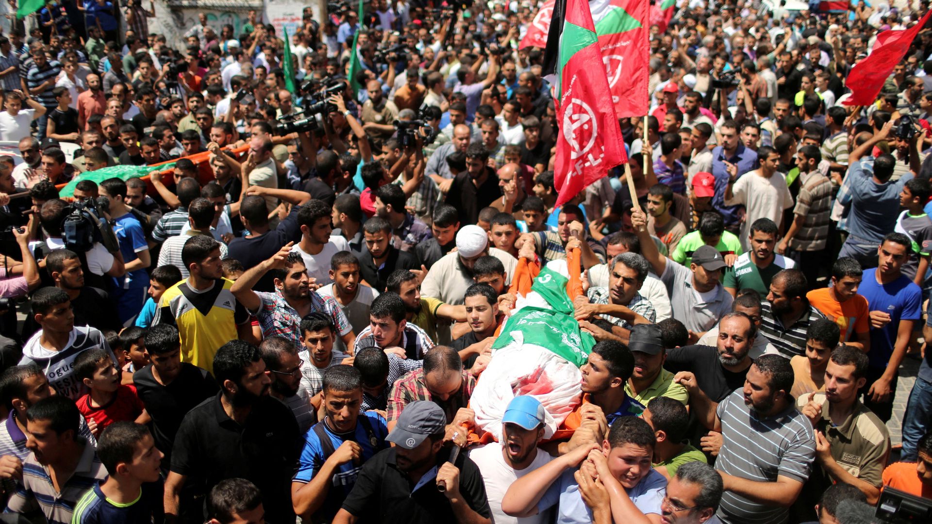 The 2014 funeral of the wife of Hamas leader Mohammed Deif, his infant son Ali and other Palestinians. /Mohammed Salem/Reuters
