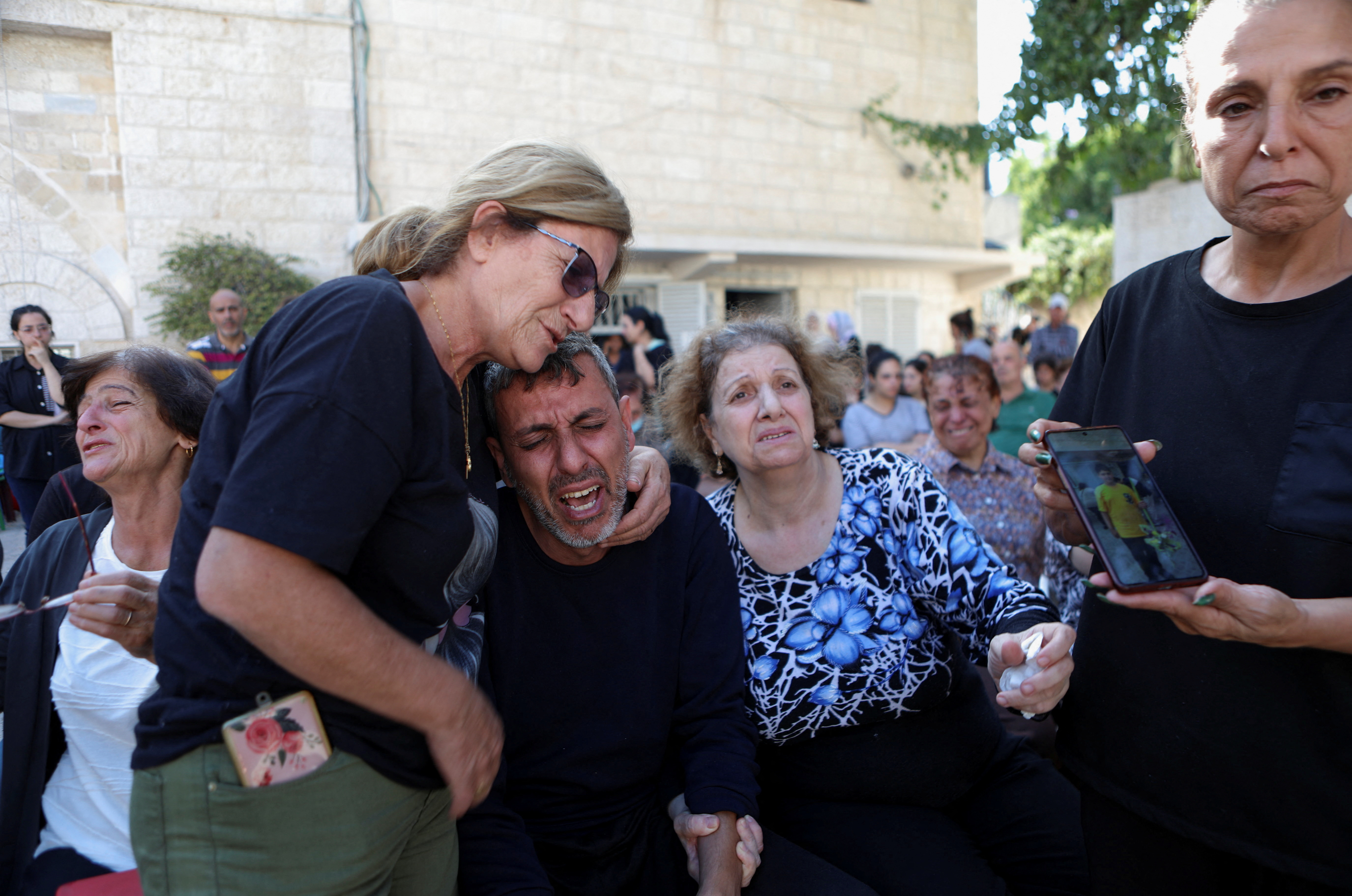 A funeral for Palestinians killed in an Israeli strike that damaged the Greek Orthodox Saint Porphyrius Church. /Mohammed Al-Masri/ Reuters