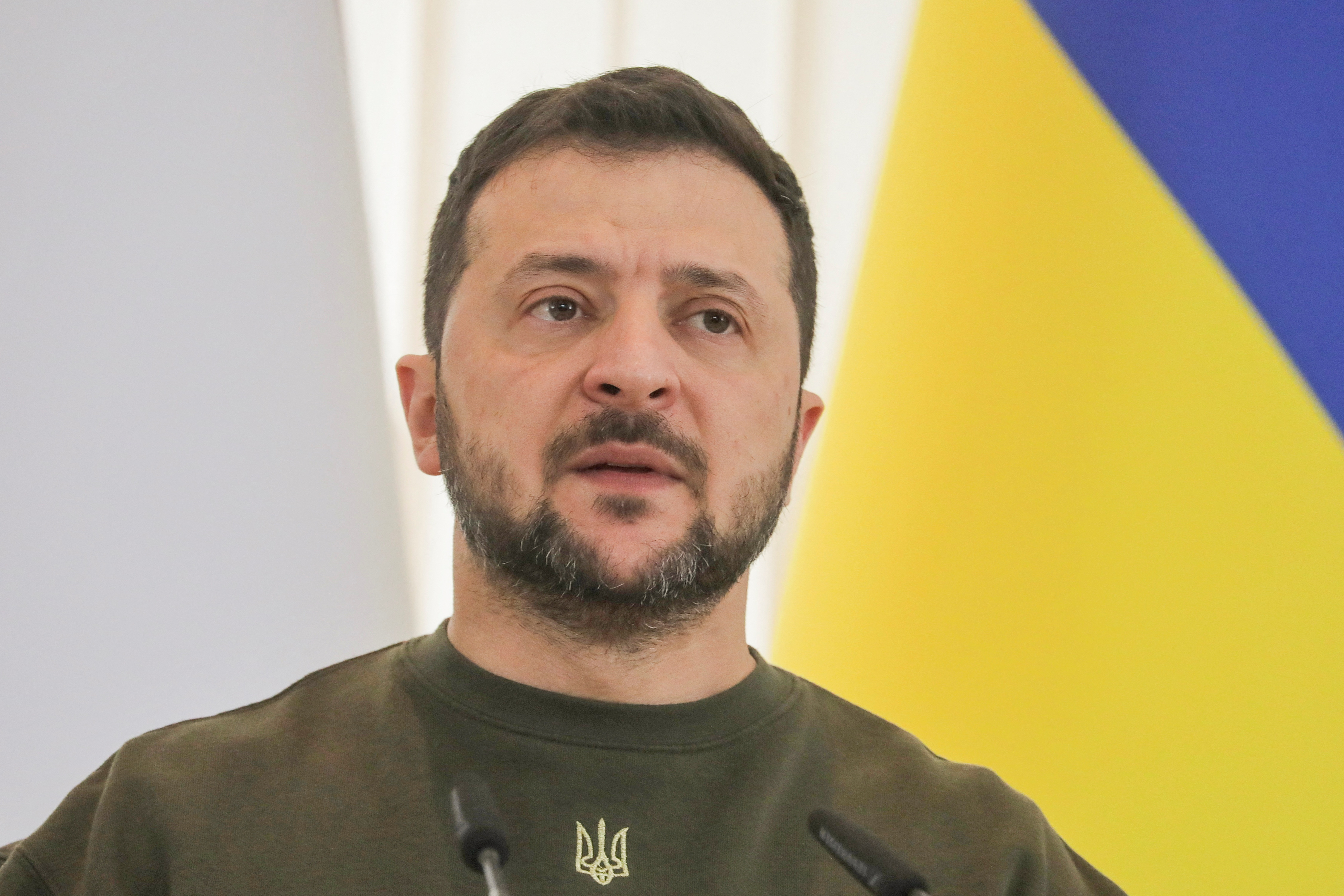 Ukrainian President Volodymyr Zelenskyy is considering holding a presidential election in spring 2024, according his Foreign Minister./Reuters/Nina Liashonok.