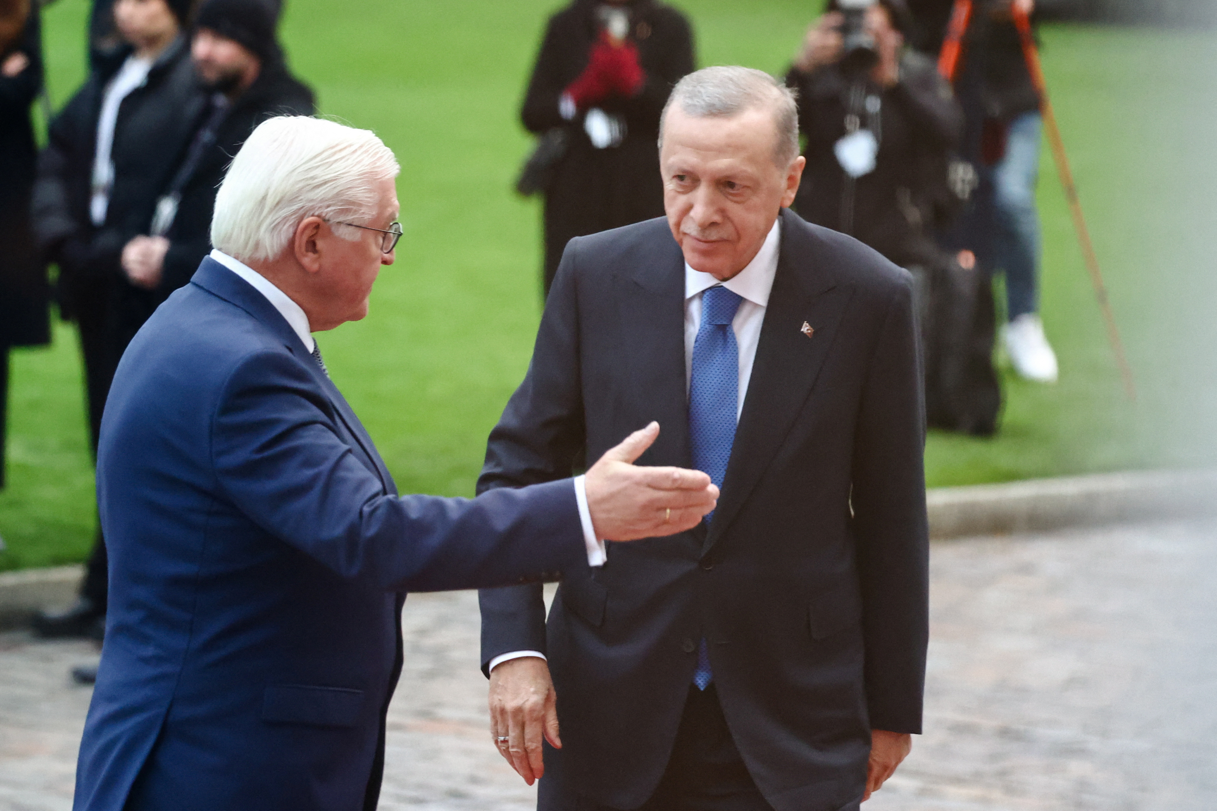 Erdogan is welcomed by German President Frank-Walter Steinmeier at Bellevue Castle in Berlin on Friday. /Liesa Johannssen/Reuters