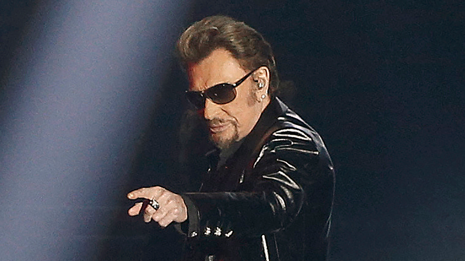 Hallyday, real name Jean-Philippe Leo Smet, is one of the world's best-selling artists. /Francois Guillot/AFP