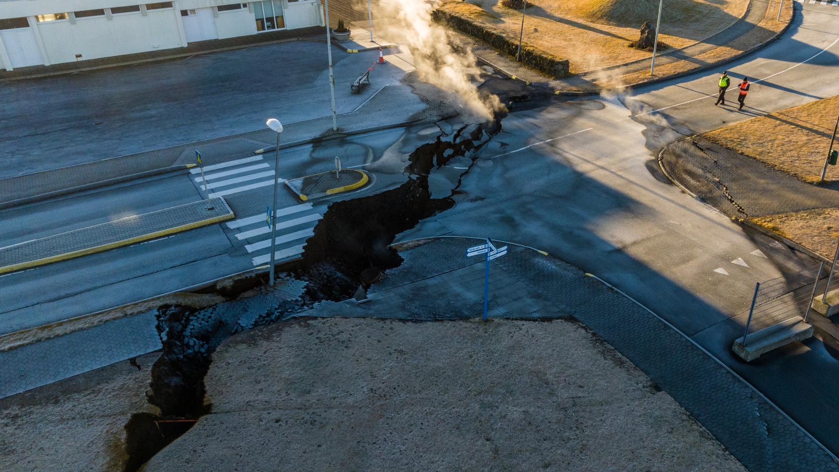 Crack caused by volcanic activity in a major road in Grindavik./Iceland media pool
