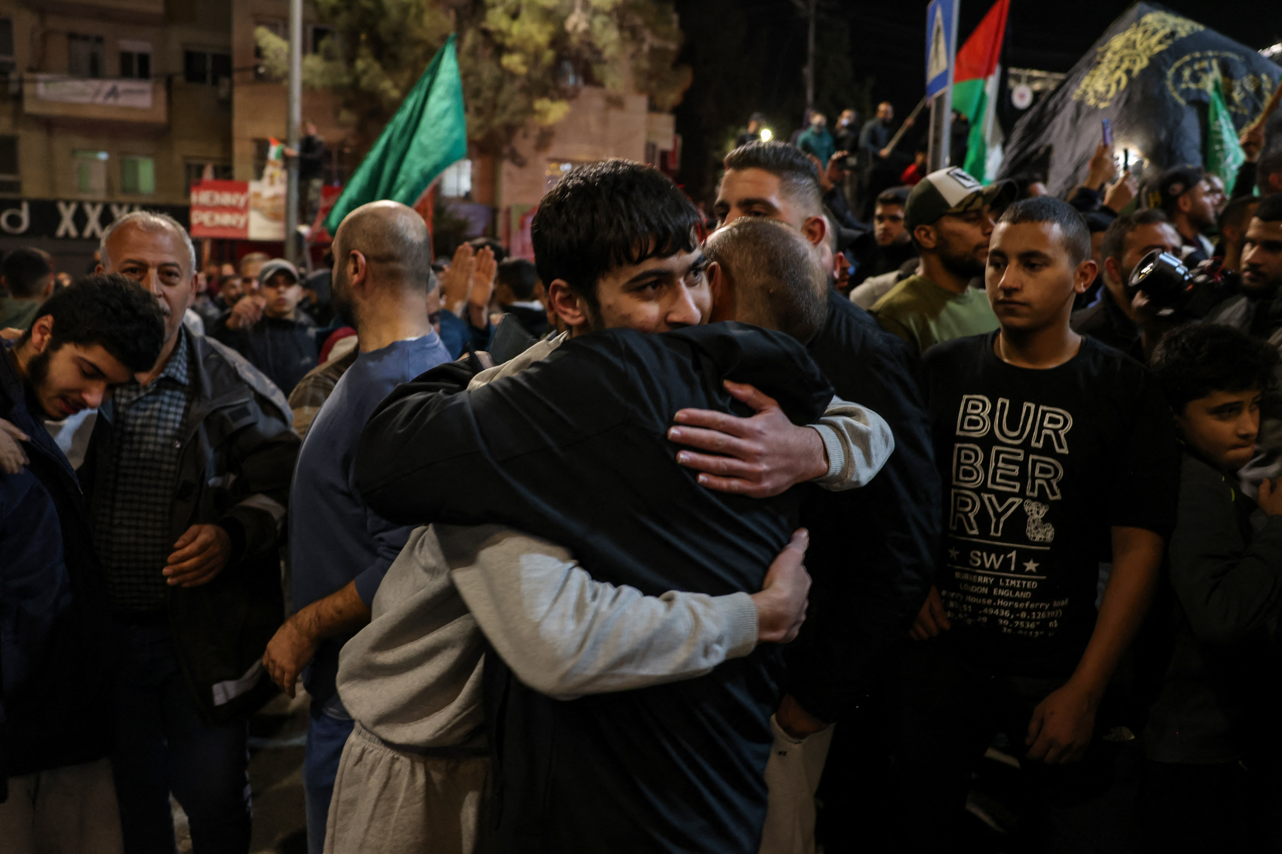 A Palestinian prisoner is welcomed by a relative after being released from an Israeli jail. /Ahmad Gharabli/AFP