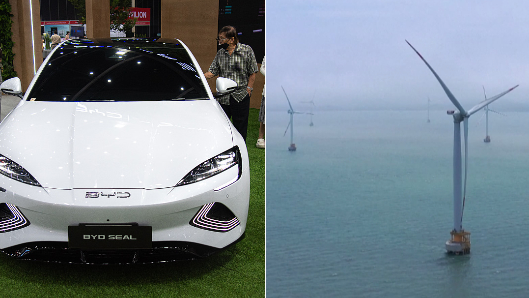 Electric vehicles and wind power are helping China's push towards a greener future. /CFP