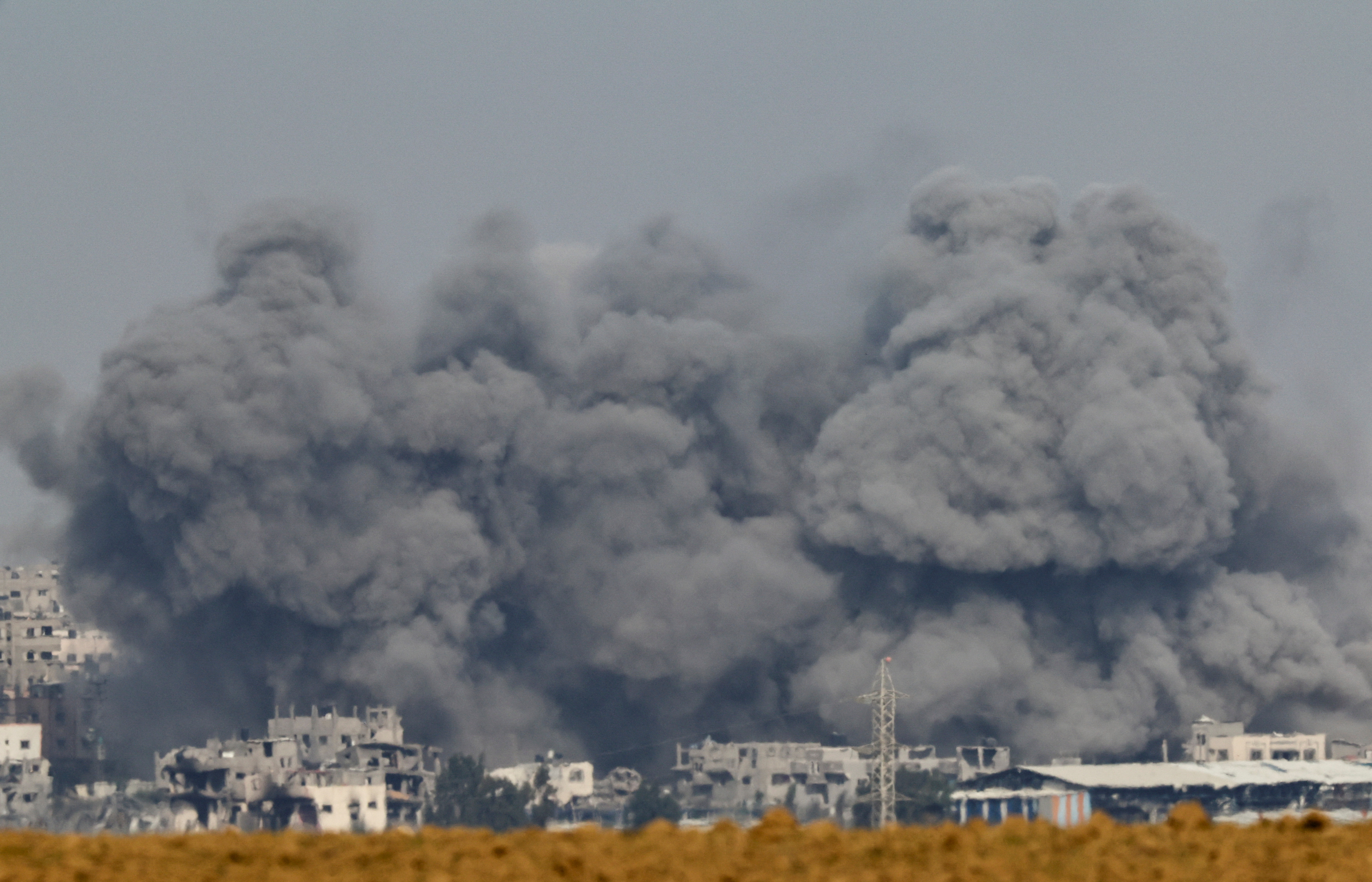 As the bombing continues, Israeli forces have been accused of killing a journalist. /Athit Perawongmetha/Reuters
