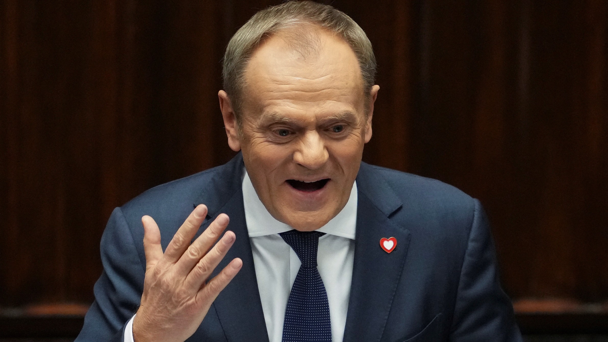 Newly appointed Polish Prime Minister Donald Tusk presents his government's program and asks for a vote of confidence in Parliament in Warsaw./ Aleksandra Szmigiel/Reuters