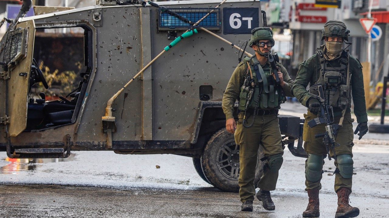 Israeli soldiers patrol in Jenin in the occupied West Bank. /Zain Jaafar/AFP