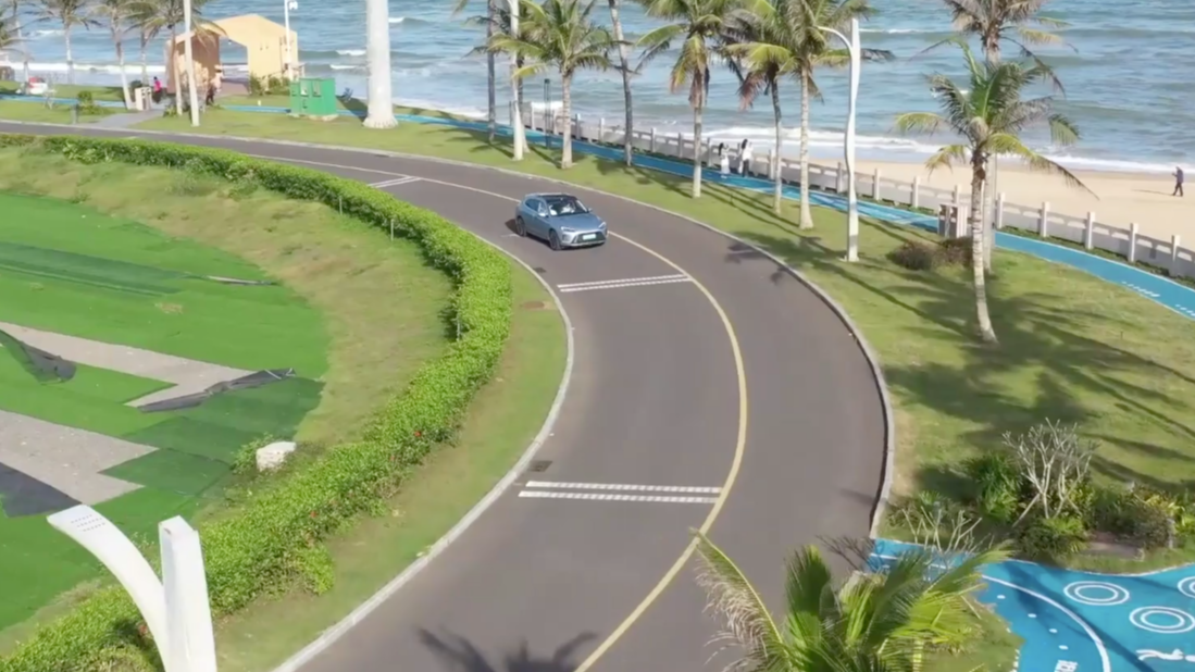 A road designed for round-the-island tours of south China's tropical Hainan Province officially opened on Monday. /CGTN.