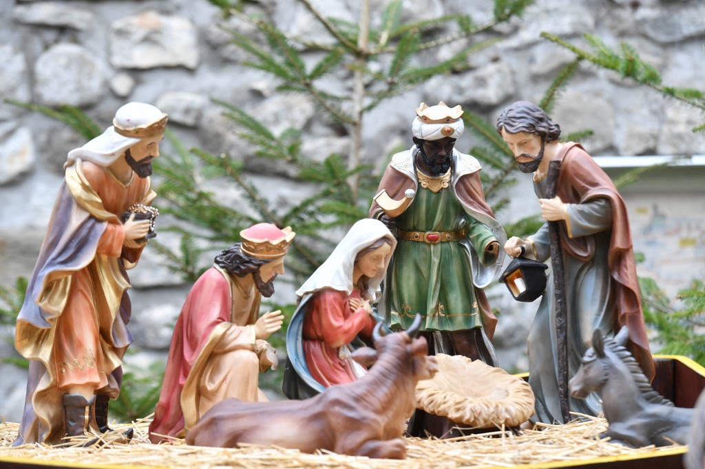 Nativity scenes use sculptures and figurines to depict the birth of Jesus Christ. But when and why did the tradition begin? /Yann Coatsaliou/AFP