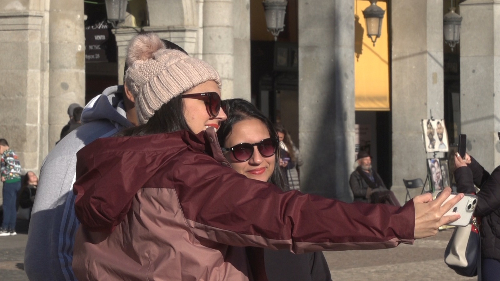 Tourists in Madrid enjoy the sun in December 2023. /Ken Browne/CGTN Europe