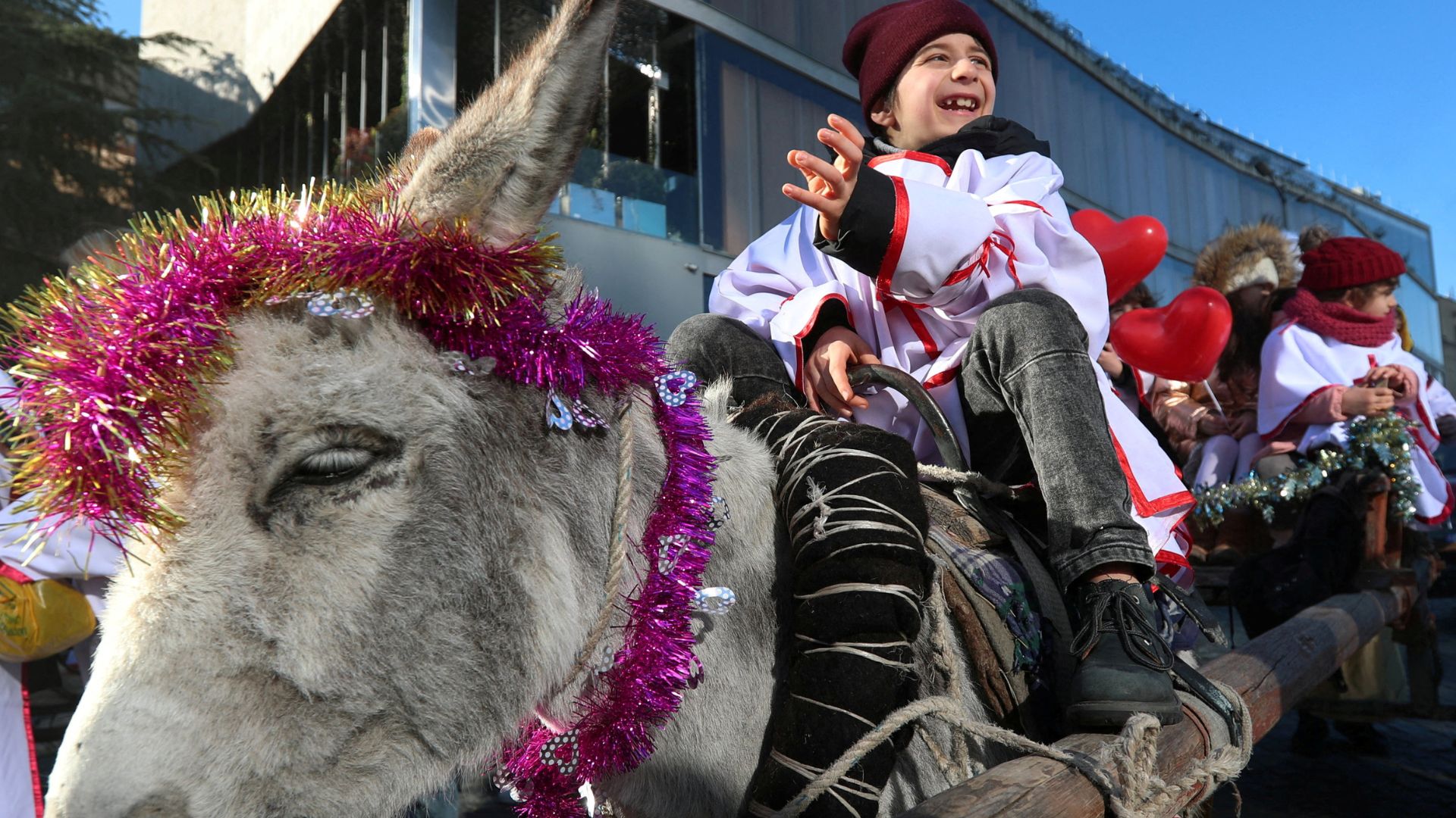 A boy takes part in the traditional religious procession Alilo, marking Orthodox Christmas, in Tbilisi, Georgia. /Irakli Gedenidze/Reuters