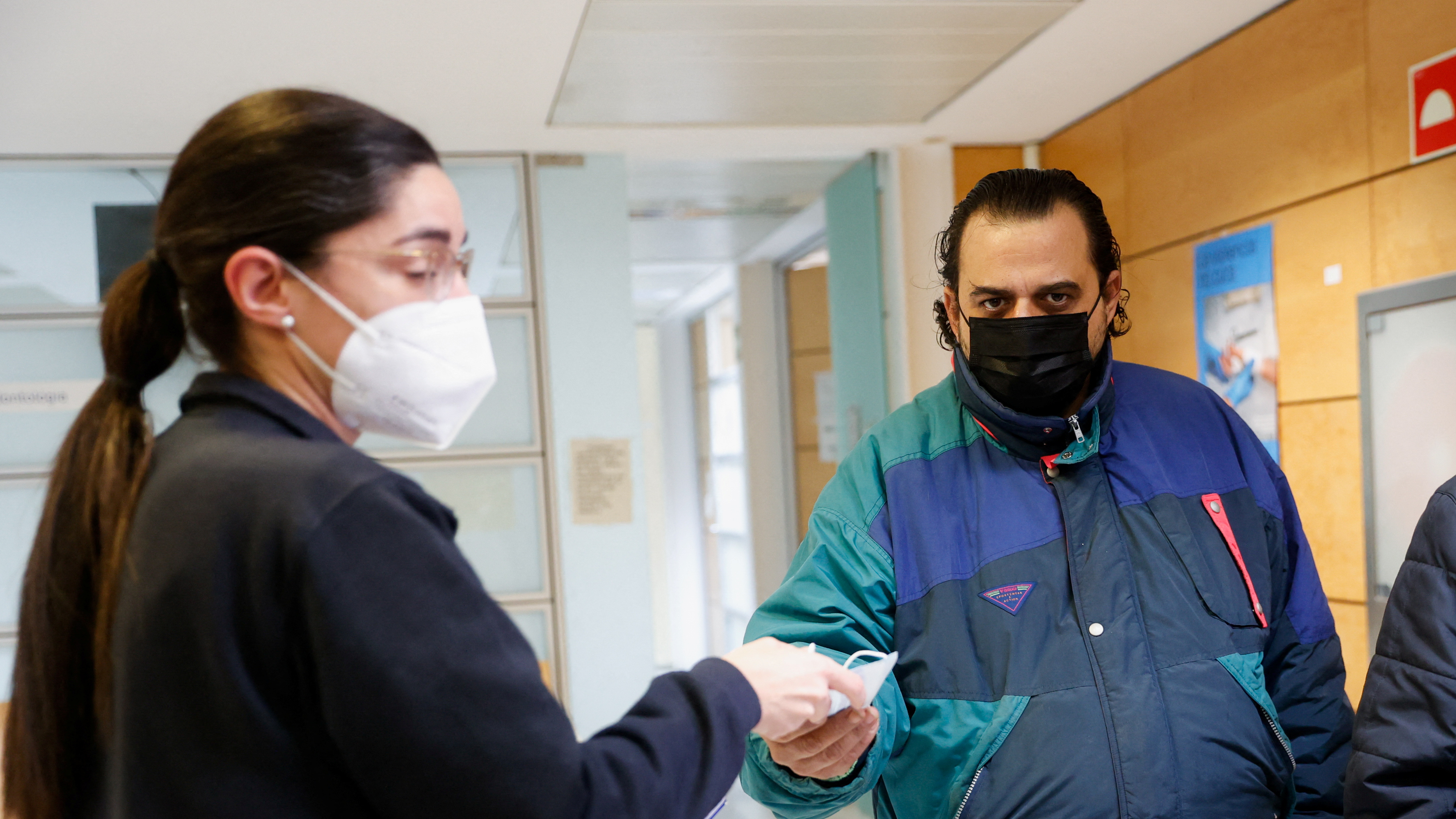 Spain's health ministry says it will be mandatory for masks to be worn in hospitals and other healthcare facilities following an outbreak of flu. /Eva Manez/Reuters.