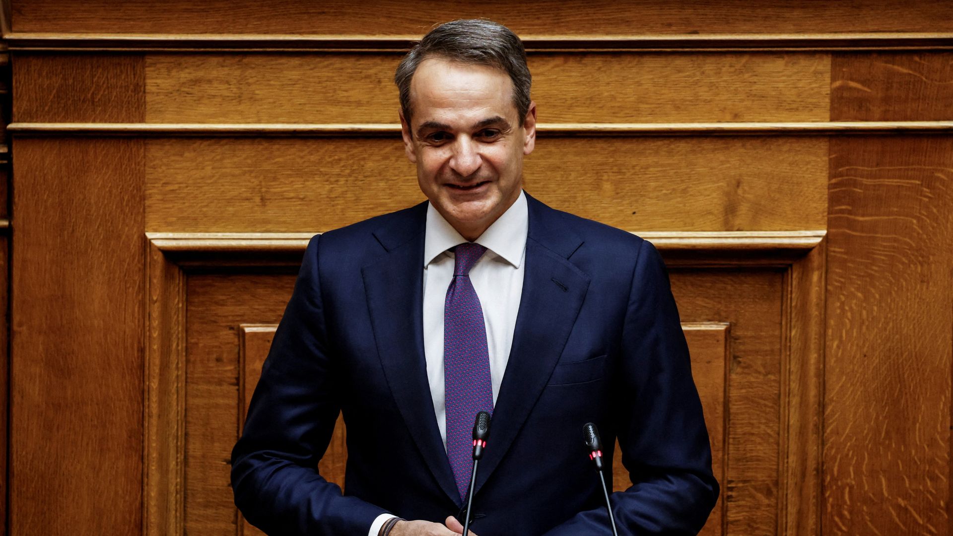 Greek Prime Minister Kyriakos Mitsotakis addresses lawmakers in Athens.  /Louisa Gouliamaki/Reuters