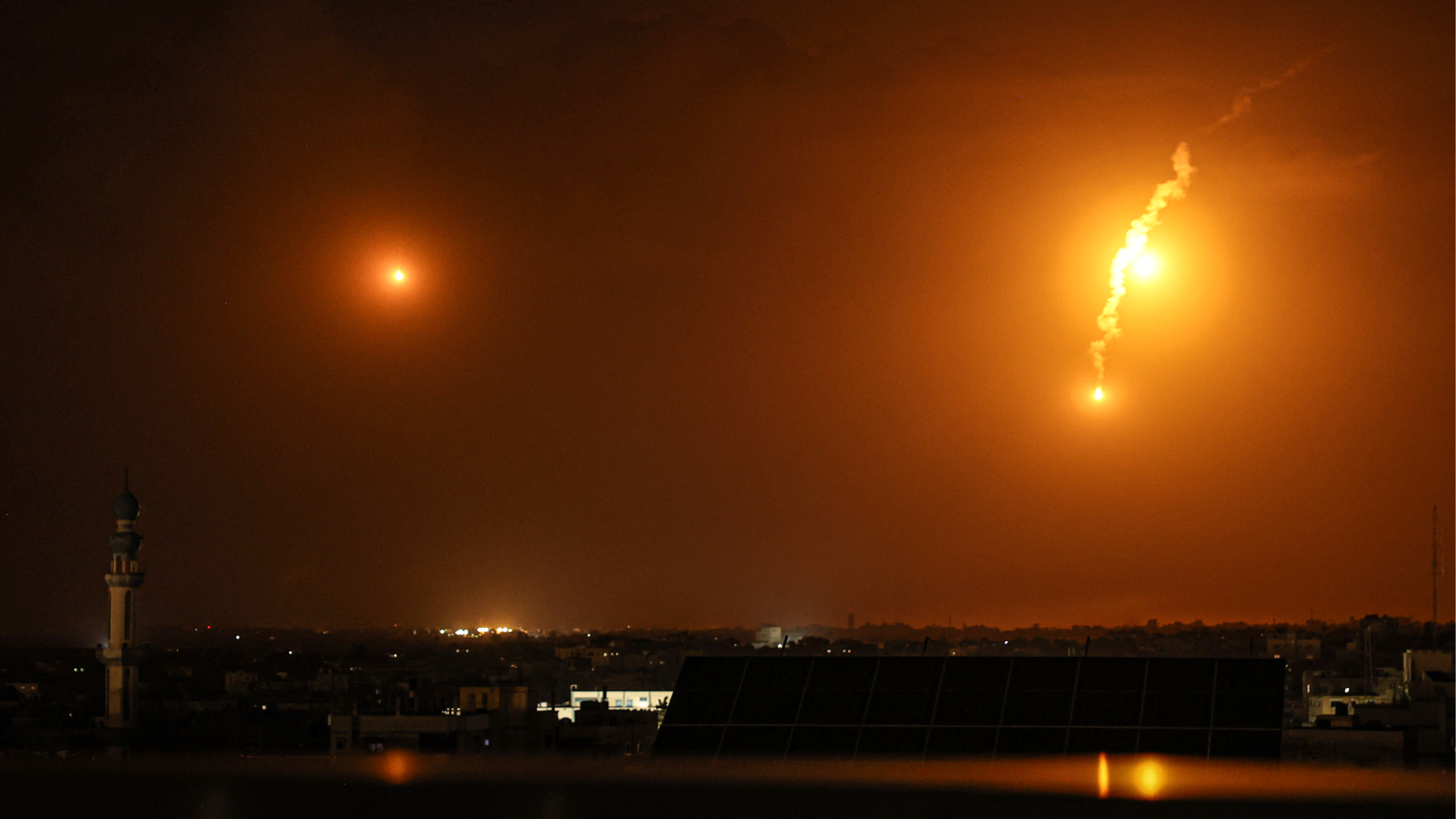 Israeli fire flares over Rafah in the southern Gaza Strip. /AFP