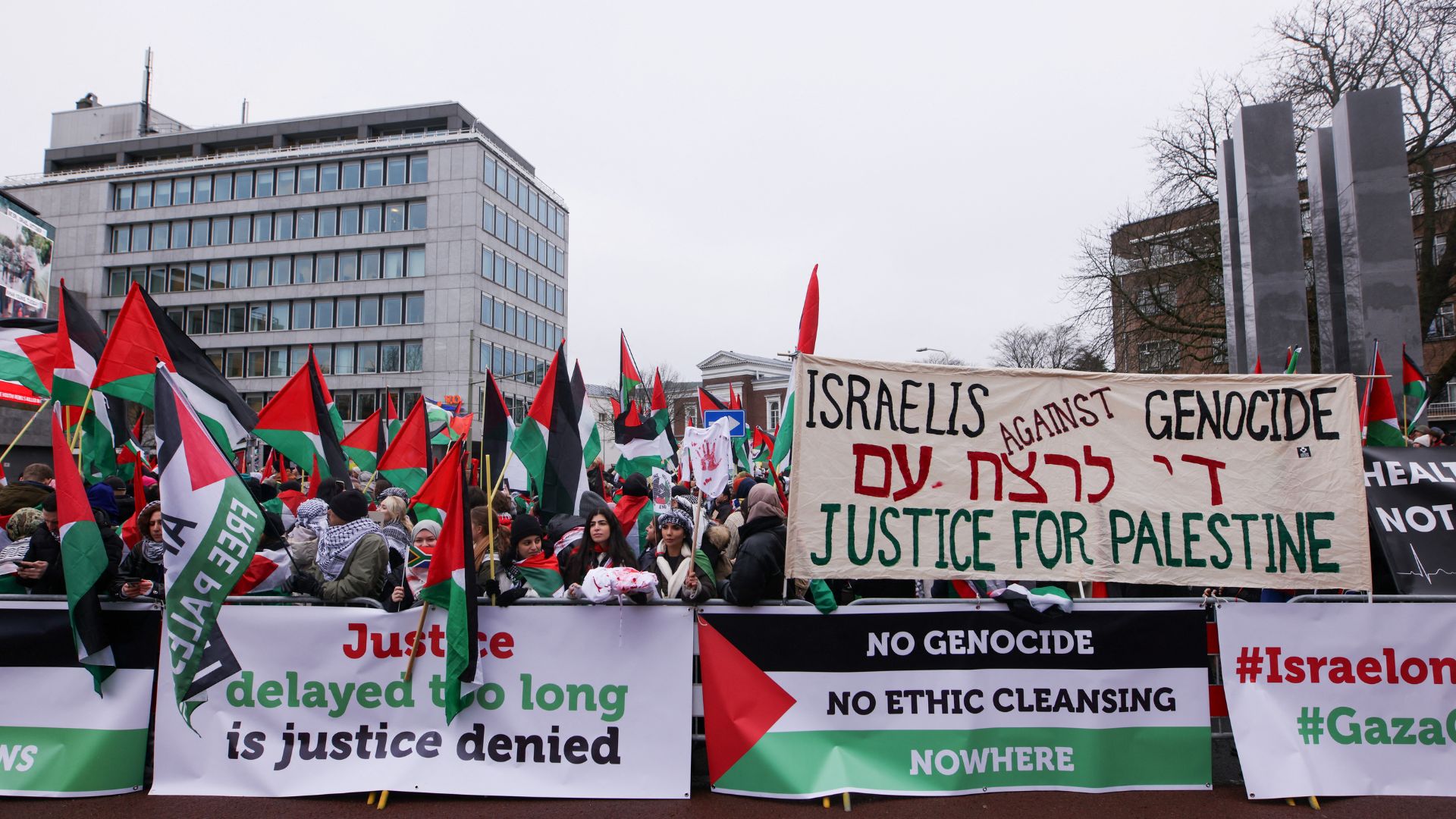 Pro-Palestinian protesters gather near the ICJ. /Thilo Schmuelgen/Reuters