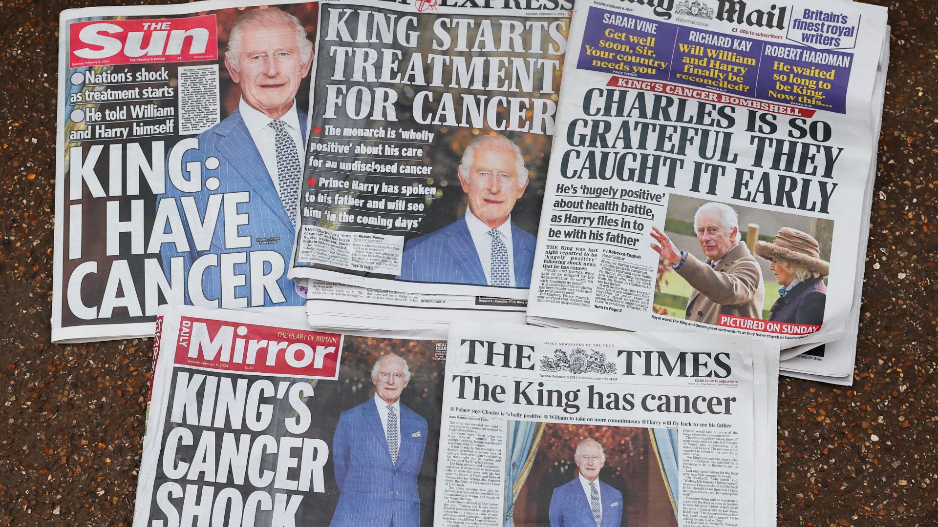 British newspapers reporting Charles' cancer diagnosis. /Toby Melville/Reuters