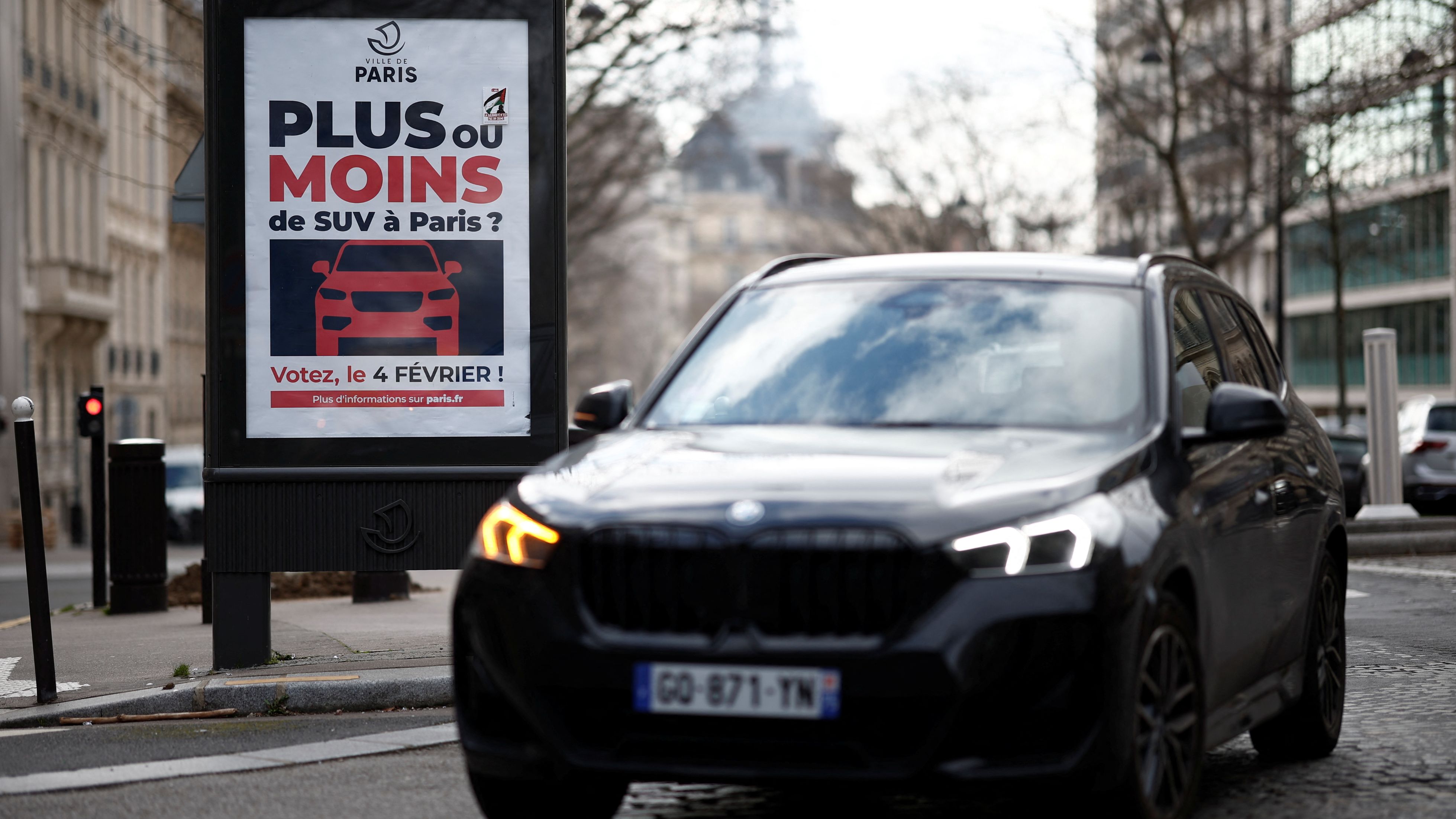 A poster reads 'More or less SUVs in Paris?' ahead of Sunday's public vote in the French capital. /Benoit Tessier/Reuters