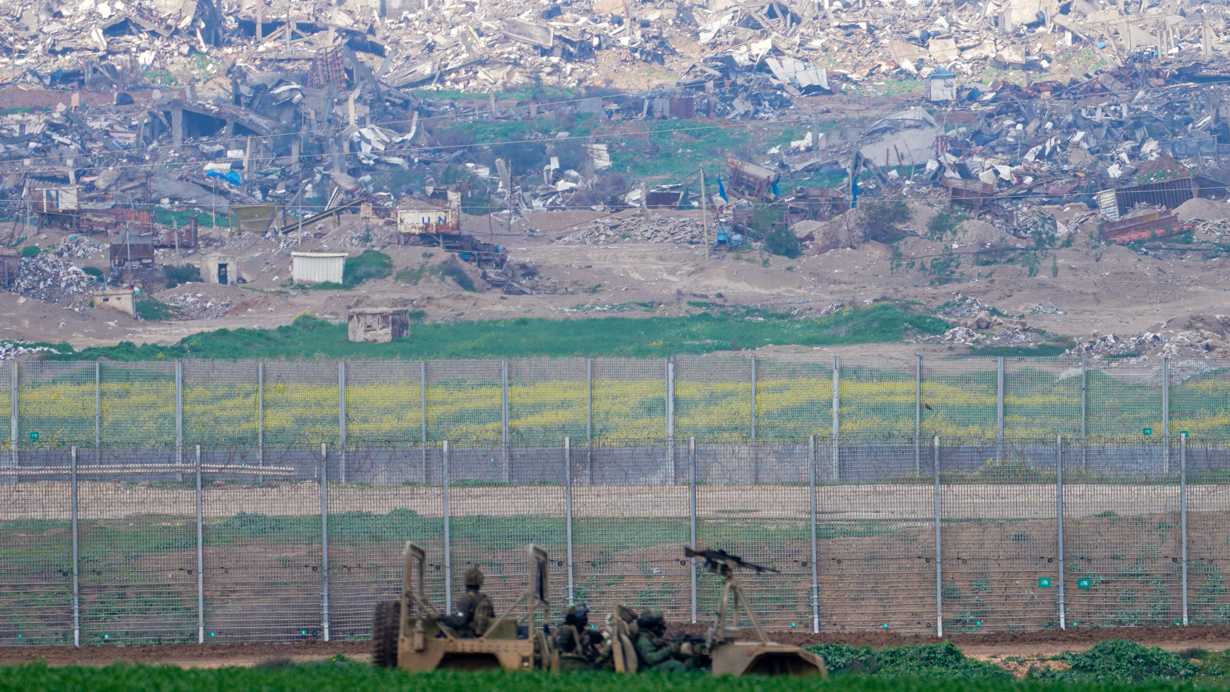 Israeli soldiers near the border with the Gaza Strip in southern Israel. /Tsafrir Abayov/AP