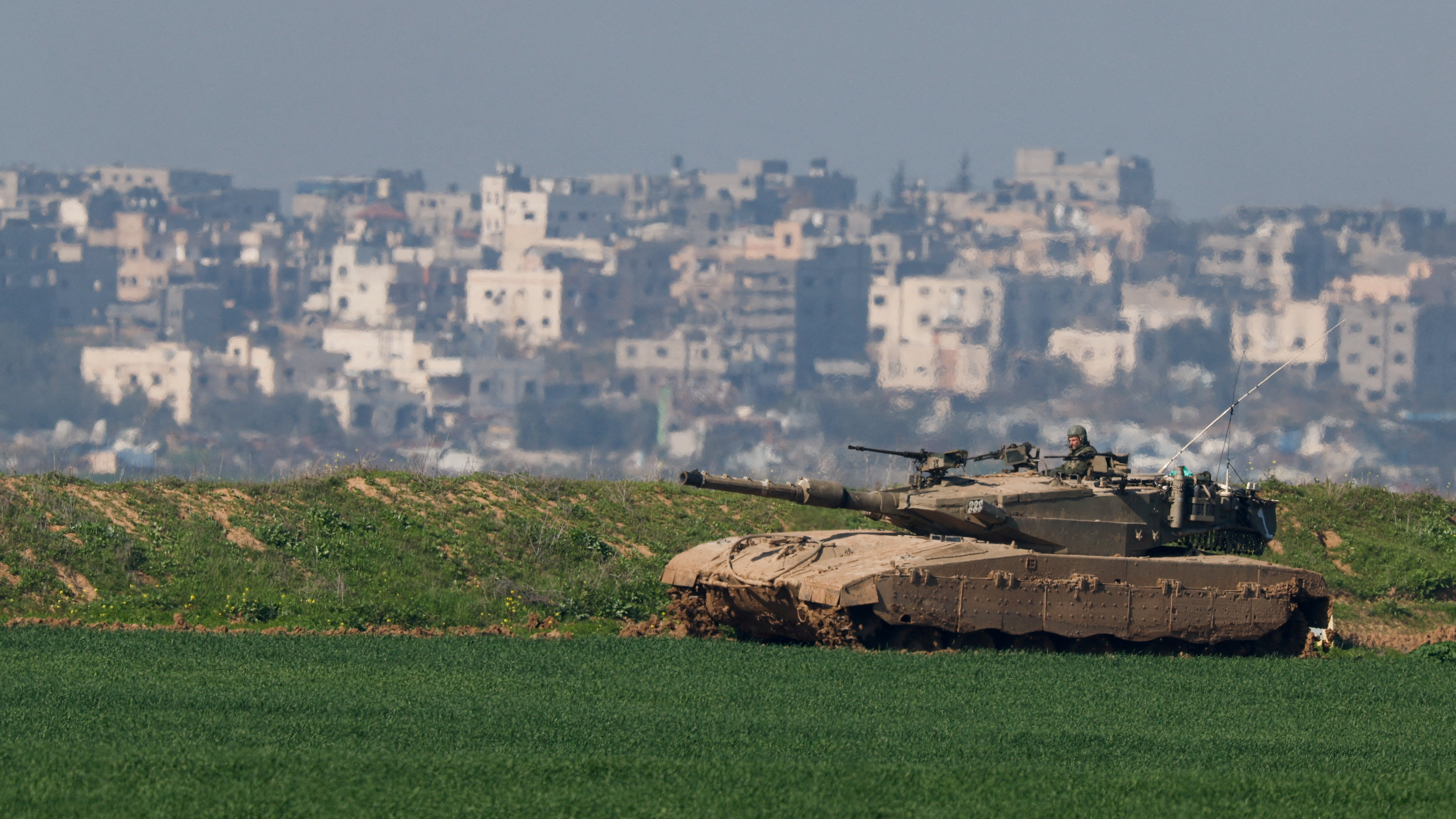 An IDF tank on patrol near the Gaza-Israel border. /Amir Cohen/Reuters  