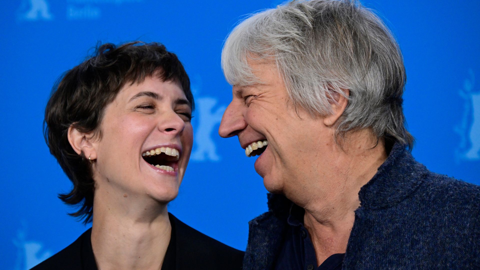 Actress Liv Lisa Fries and director Andreas Dresen share a joke at the festival photocall – but their film is deadly serious. /John MacDougall/AFP
