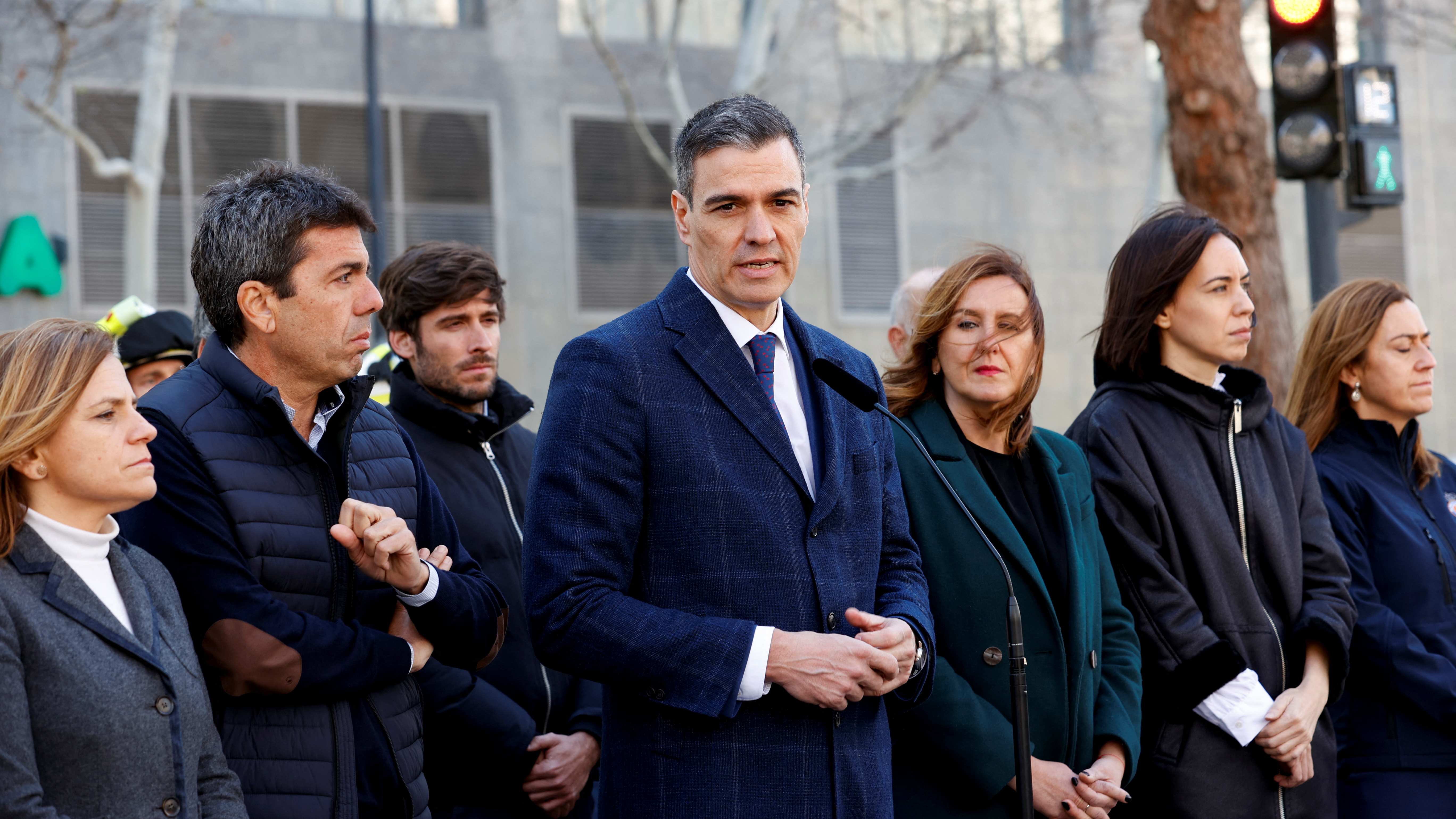Spain's Prime Minister Pedro Sanchez speaks to the media as he visits Valencia in the aftermath of the fire. /Eva Manez/Reuters