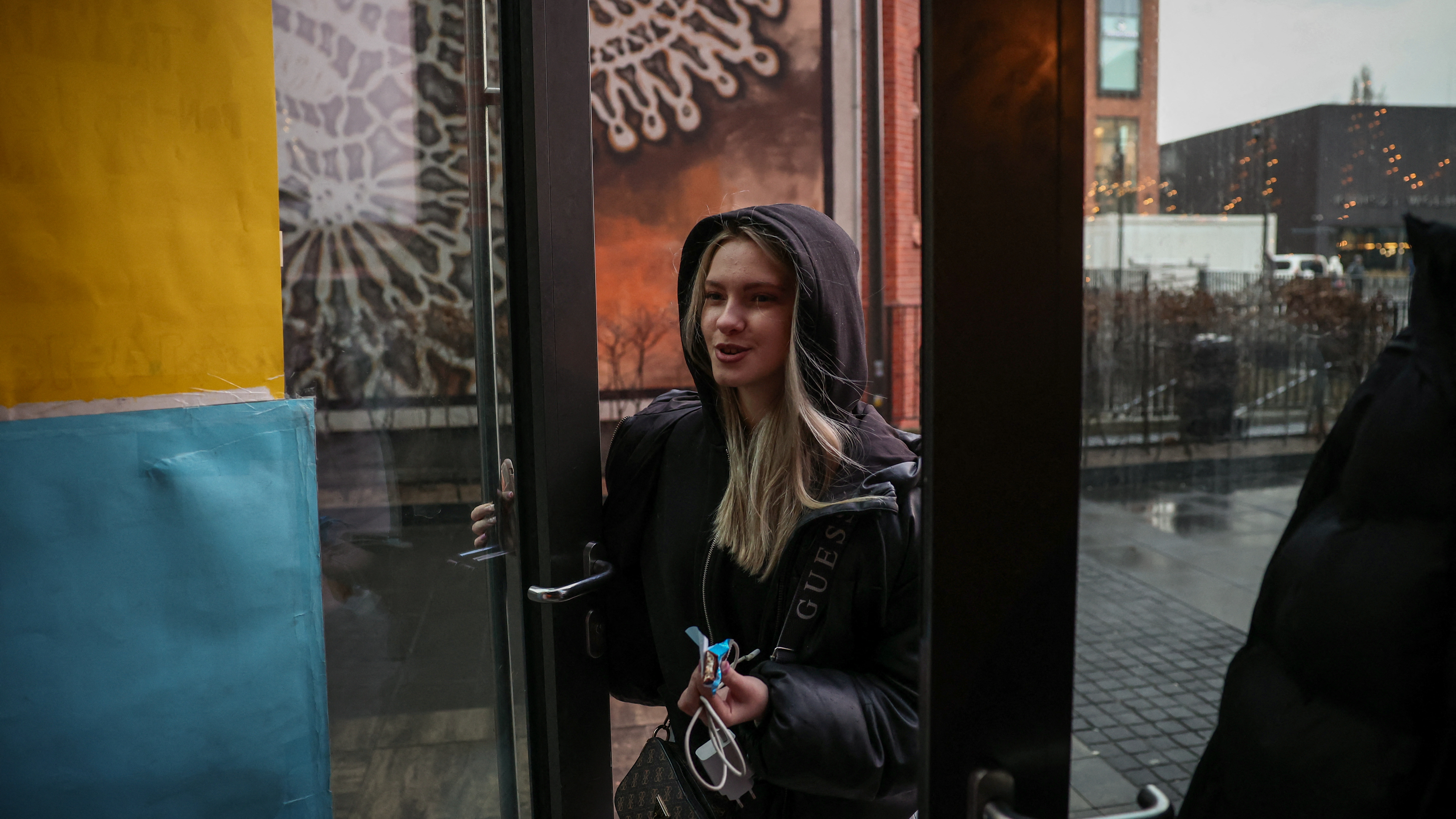 Dariia Vynohradova, 17 from Kharkiv, arrives at Blue Trainers, a community space in a shopping mall in Gdansk, Poland. Around 165,000 Ukrainian teenagers between 13 and 18 years of age are registered as refugees in Poland. /Kacper Pempel/Reuters