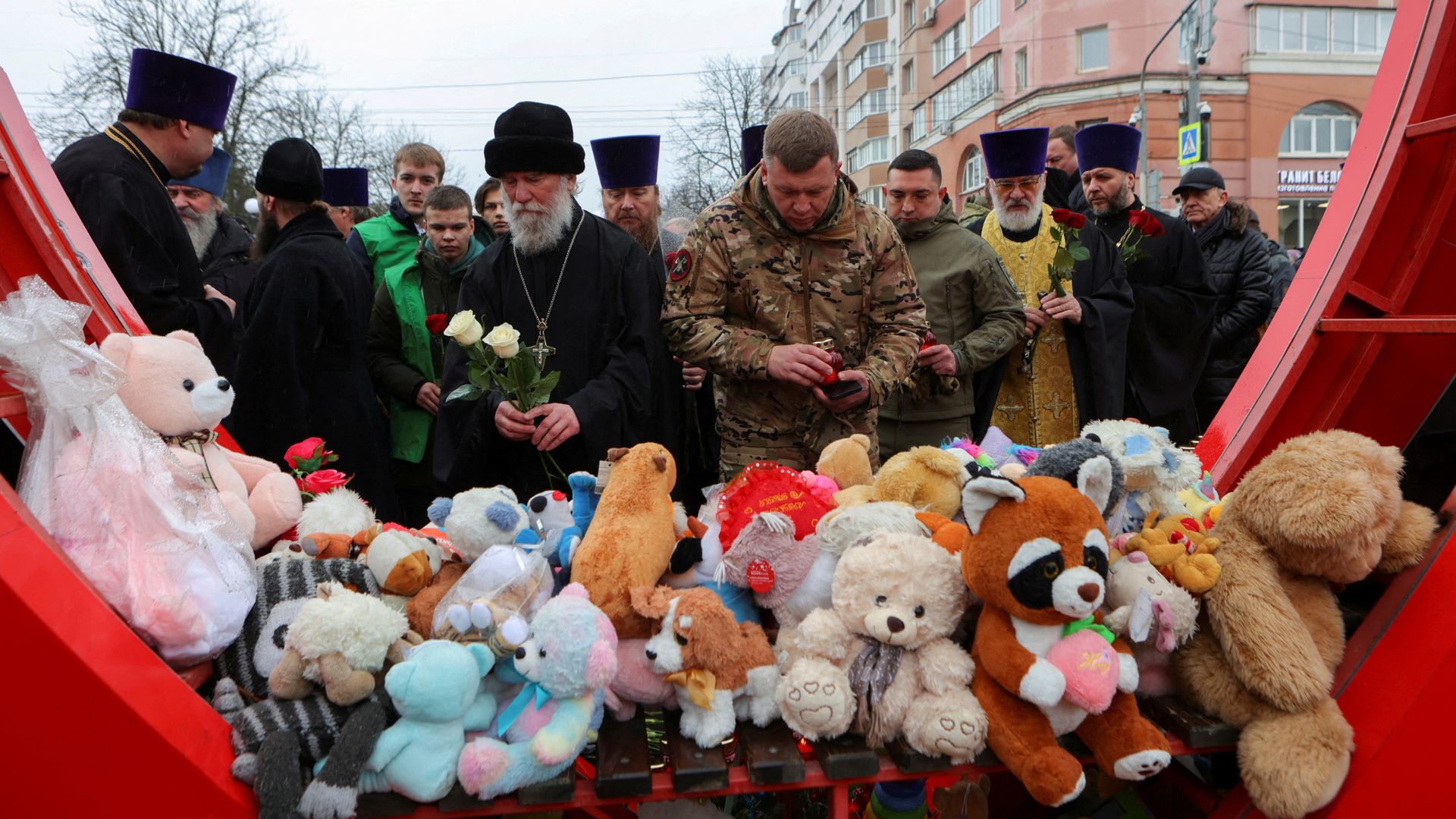 People mourn victims during a commemoration ceremony marking 40 days since a deadly military strike in Belgorod on February 7, 2024. /Reuters
