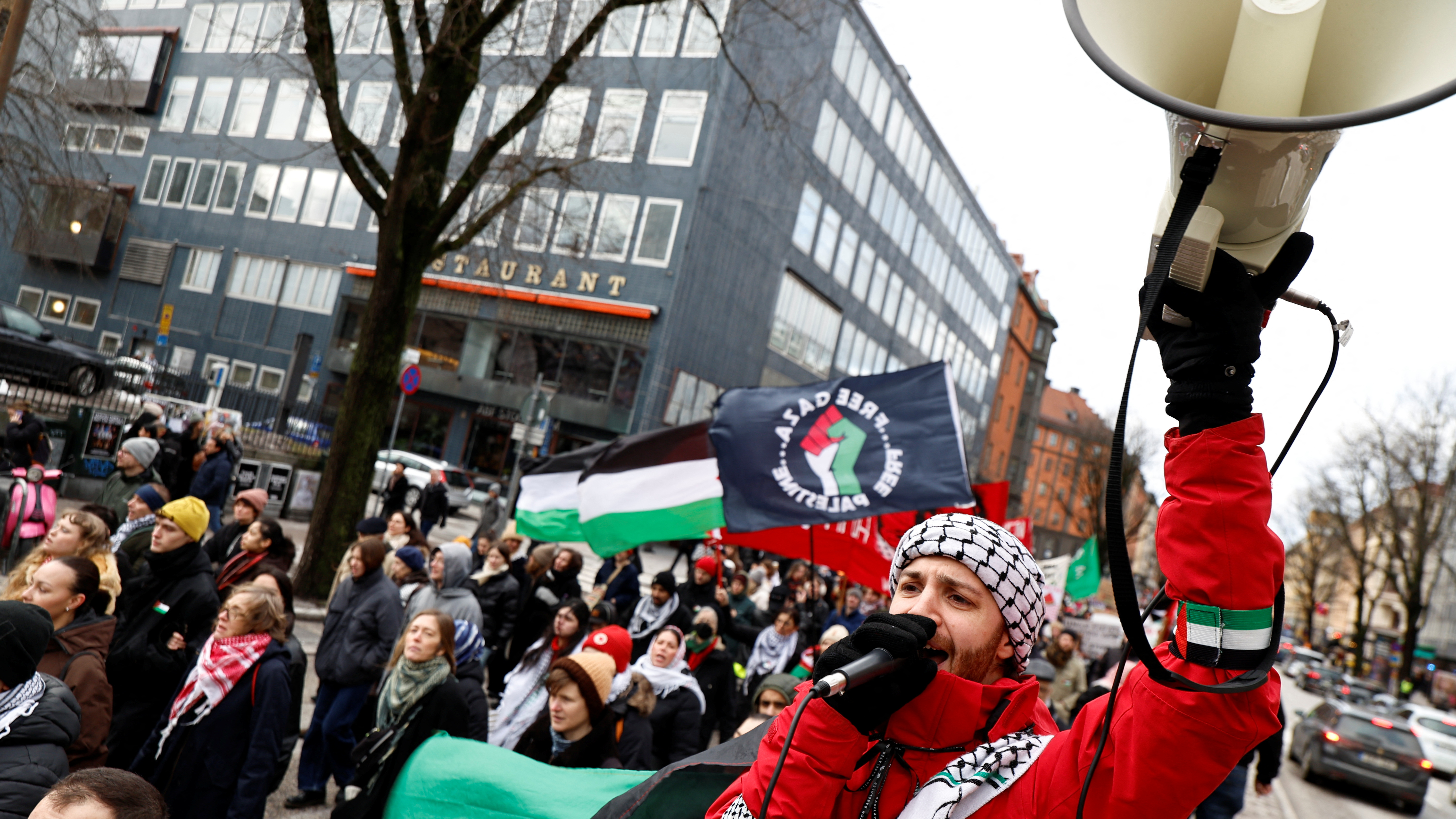 Protesters take part in a demonstration organized by 'Together for Palestine' to demand a ceasefire and exclude Israel from the Eurovision Song Contest, in Stockholm, Sweden. /Fredrik Persson/Reuters