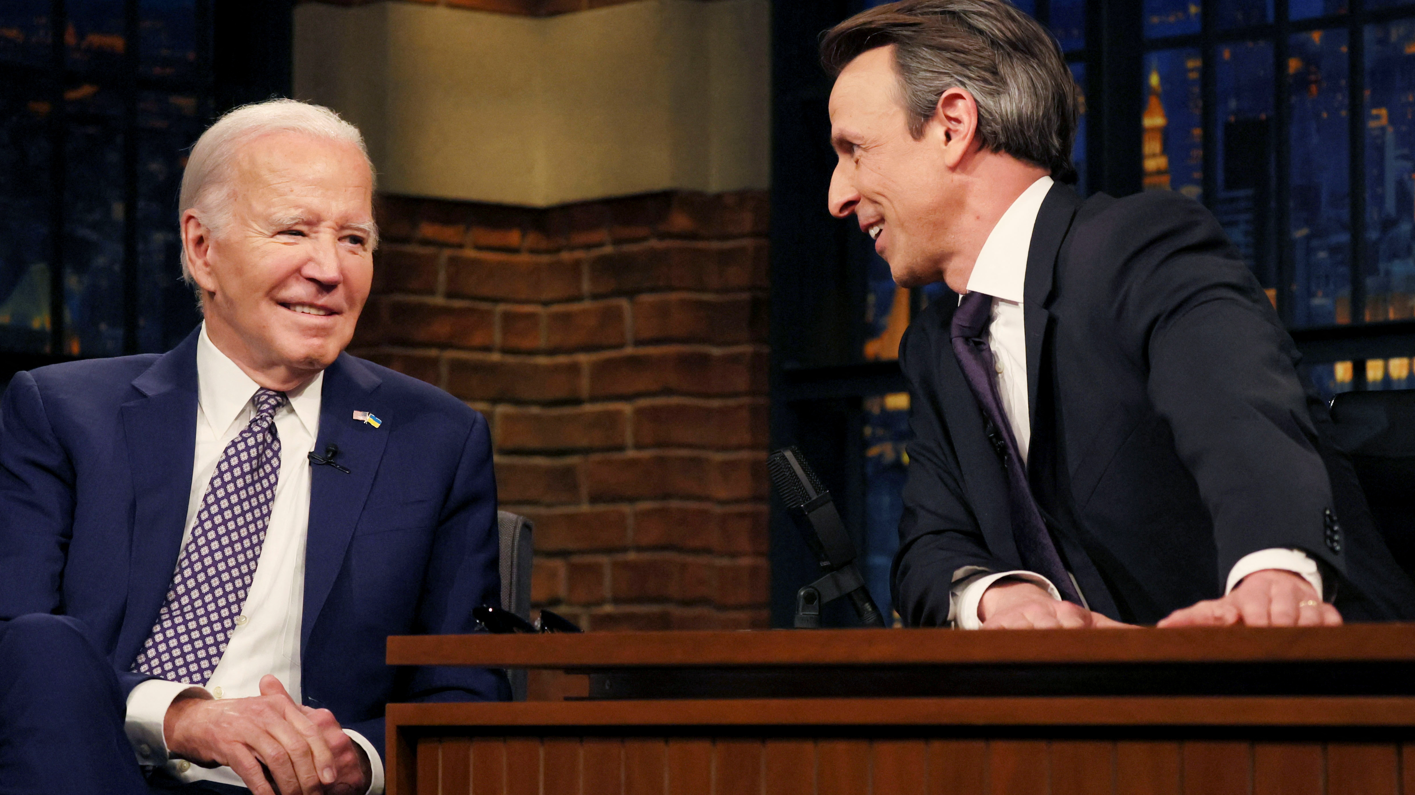 U.S. President Joe Biden laughs during his NBC TV interview. /Leah Millis/Reuters