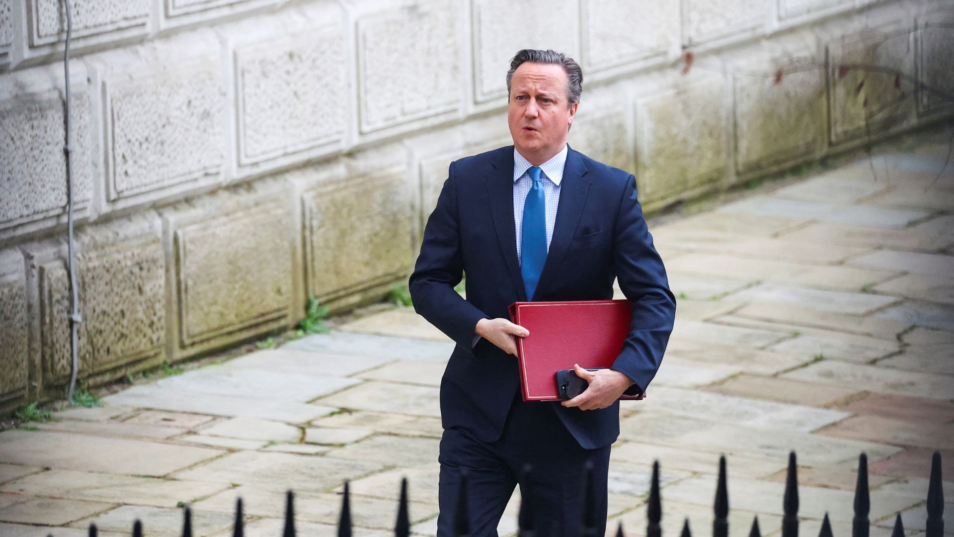 UK Foreign Minister David Cameron walks to attend a cabinet meeting in London. /Toby Melville/Reuters

