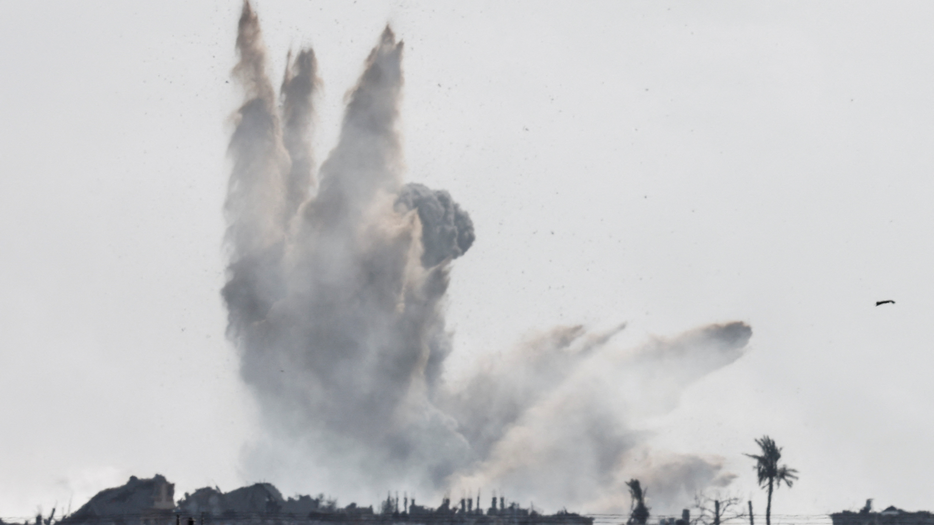 Smoke rises from an Israeli airstrike in Gaza /Amir Cohen/Reuters
