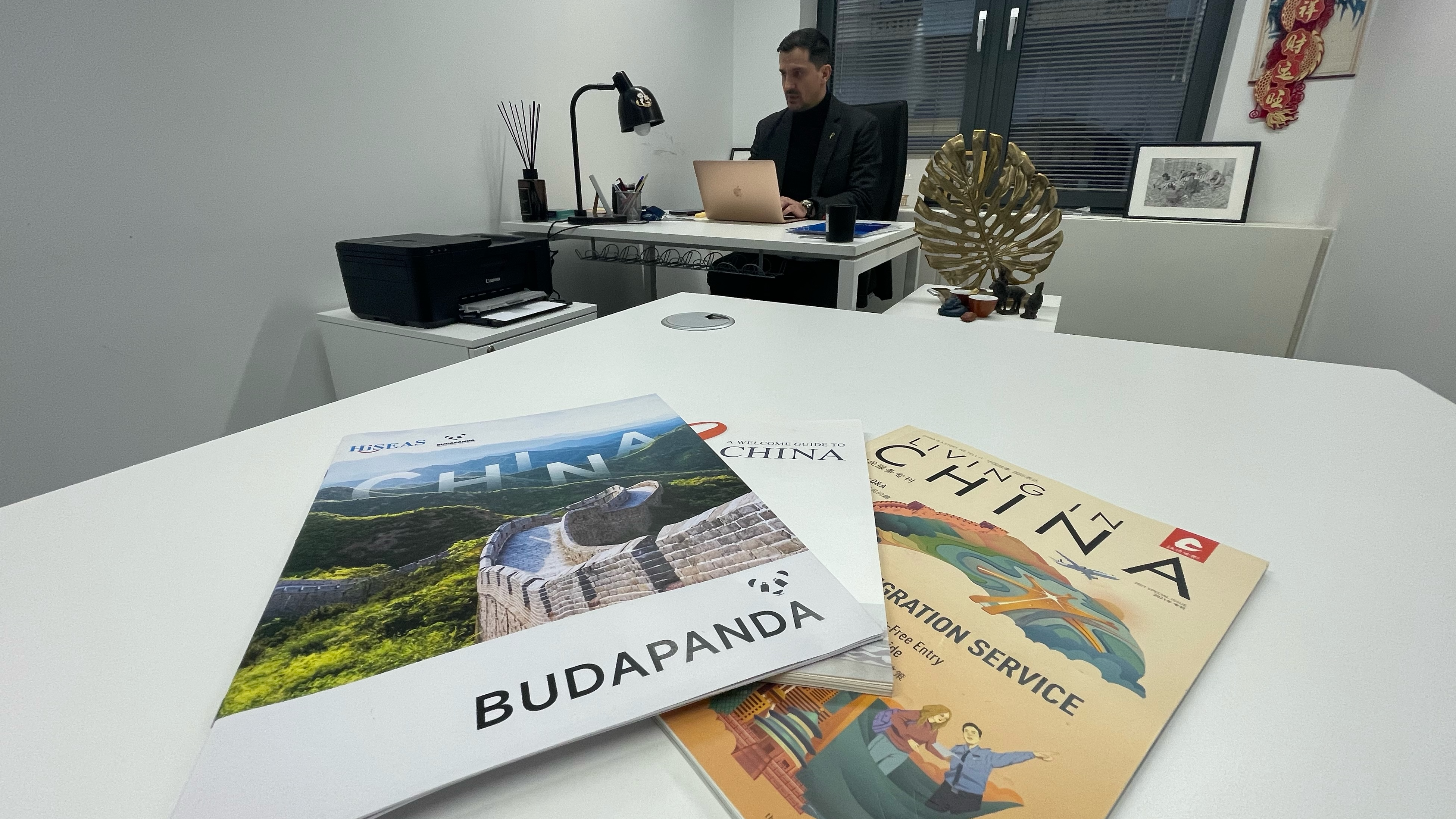 Travel agent Viktor Vereb at his desk in Budapest /Pablo Gutierrez /CGTN 