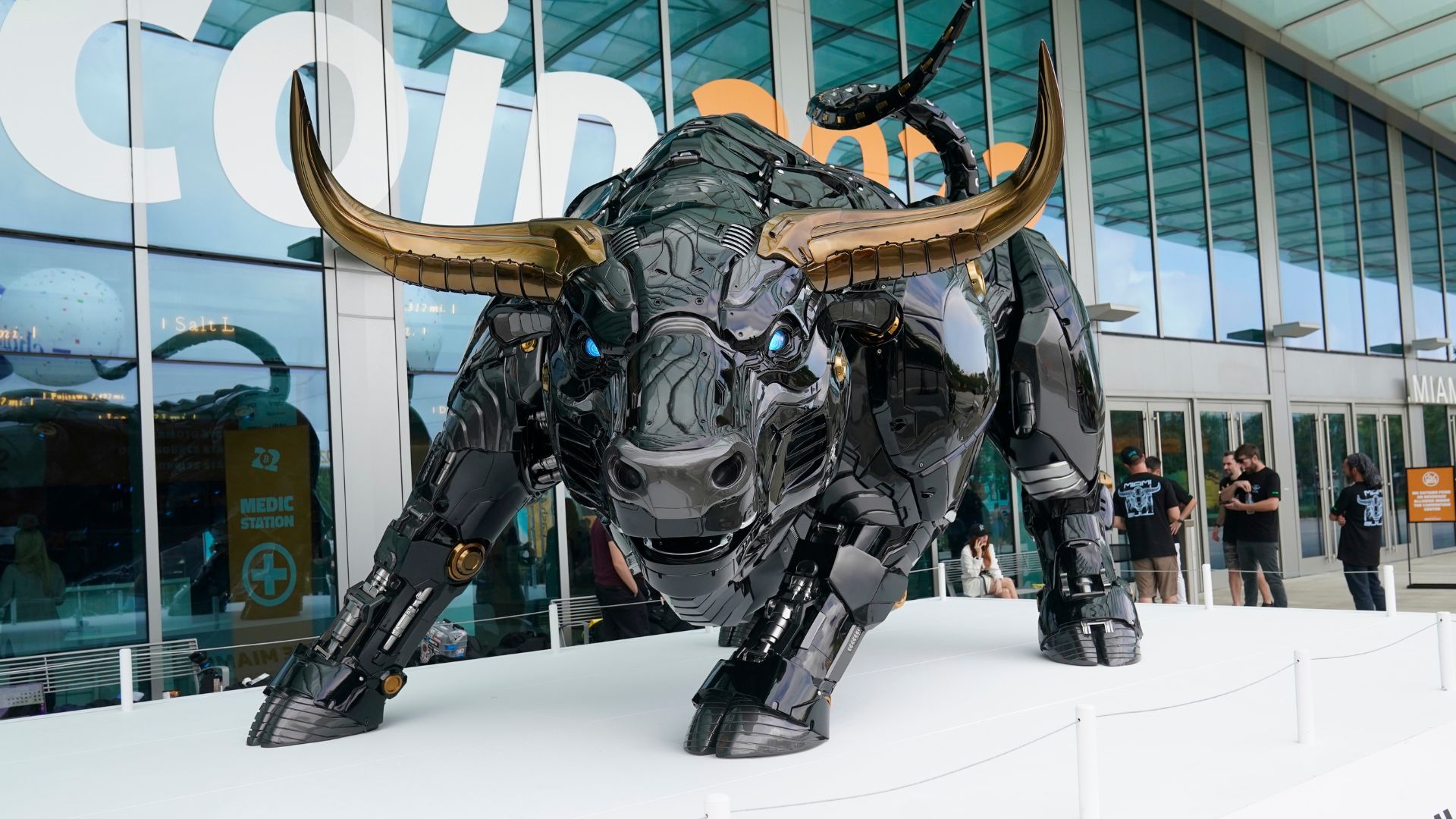 A robot-like bull statue - influenced by the famous bull statue on New York's Wall Street - stands outside a digital currency convention in Miami in 2022. /Wilfredo Lee/AP