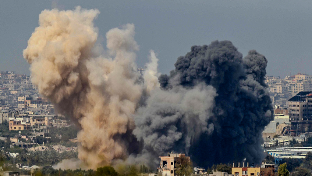 Smoke rises from the Gaza Strip in the aftermath of an IDF airstrike. /Jack Guez/CFP