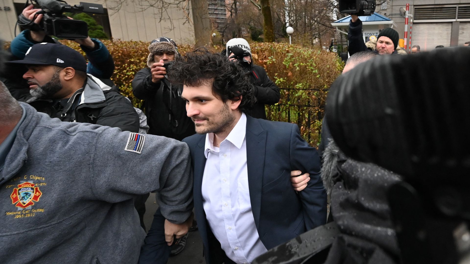 Bankman-Fried leaves court following his arraignment in New York City in December 2022. /Ed Jones/AFP