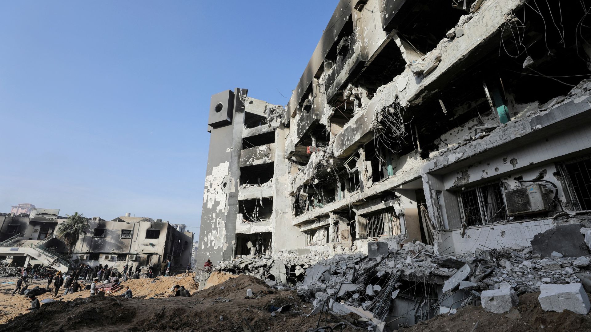 Palestinians inspect the damages at Al Shifa Hospital after Israeli forces withdrew. /Dawoud Abu Alkas/Reuters