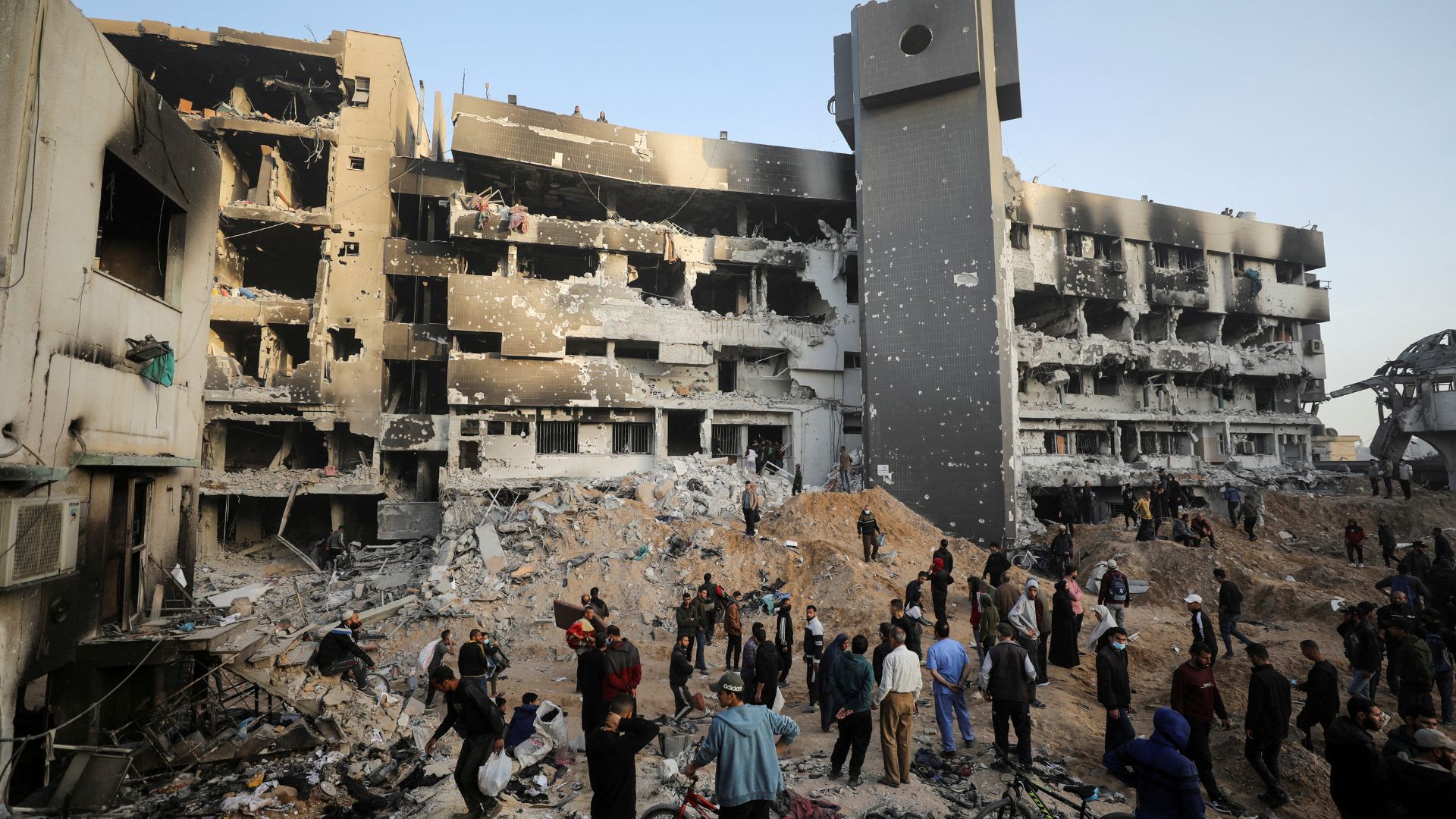 Palestinians inspect damage at Al Shifa Hospital after Israeli forces withdrew following a two-week operation. /Dawoud Abu Alkas/Reuters