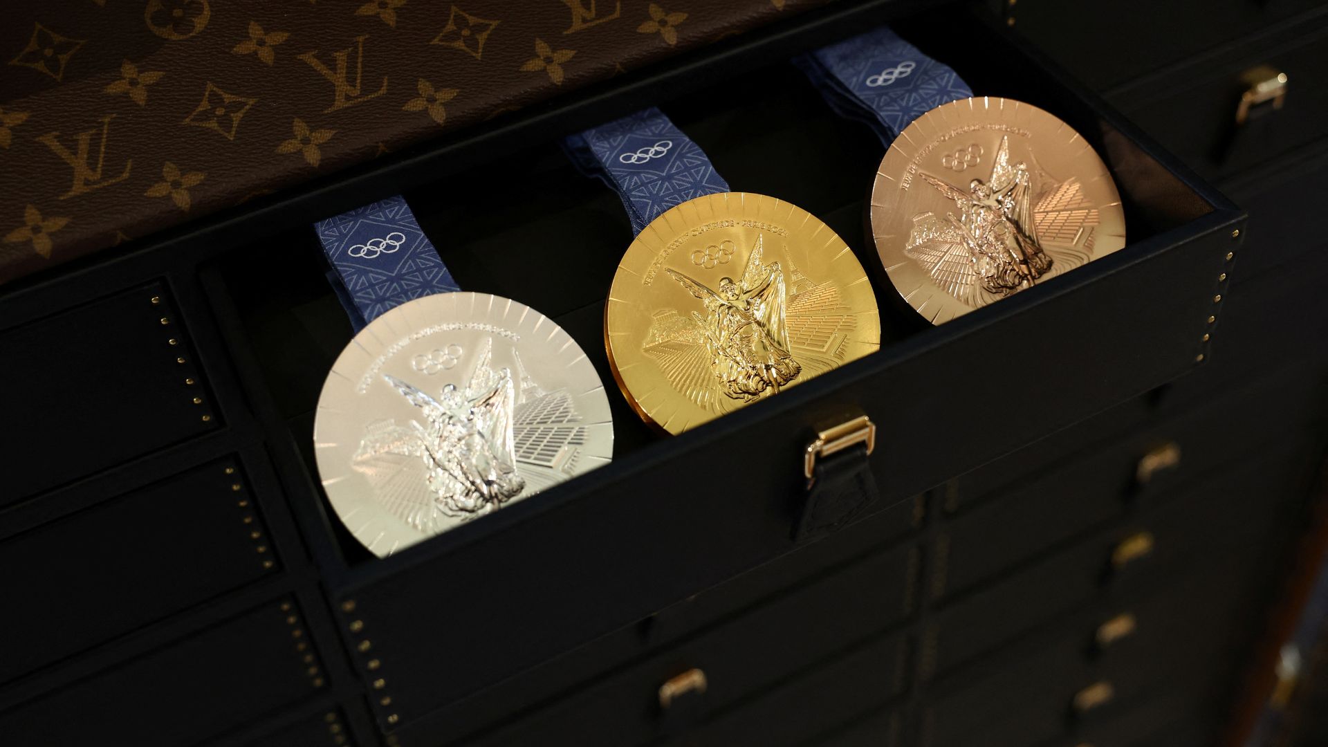 Olympics gold, silver and bronze medals in a Louis Vuitton trunk, which will transport and protect them during the Paris 2024 Olympic and Paralympic Games. /Stephanie Lecocq/Reuters