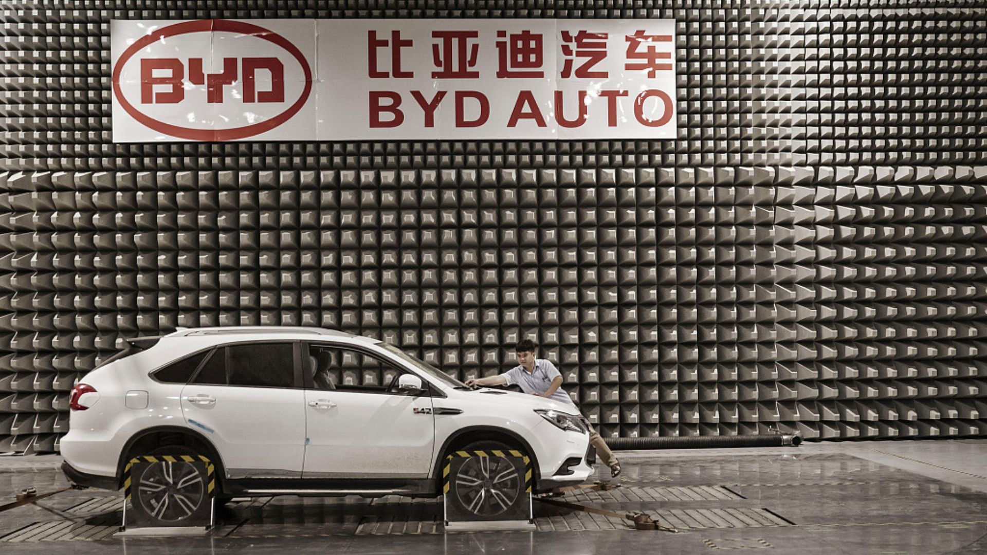 An EV sits in an electro-magnetic interference testing lab at the BYD Co. headquarters in Shenzhen in 2017. Qilai Shen/Bloomberg via Getty Imagesclose